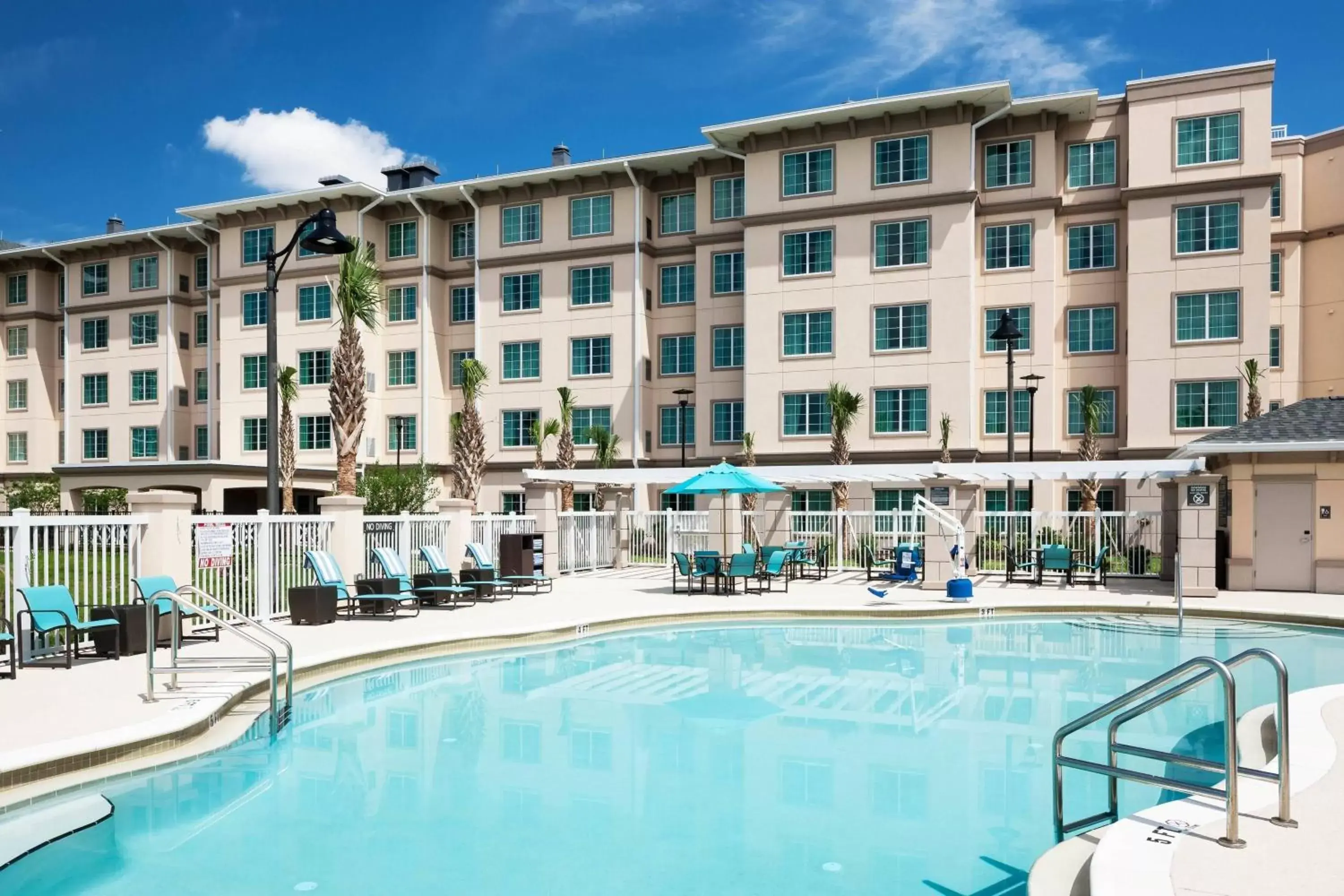 Swimming pool, Property Building in Residence Inn by Marriott Near Universal Orlando