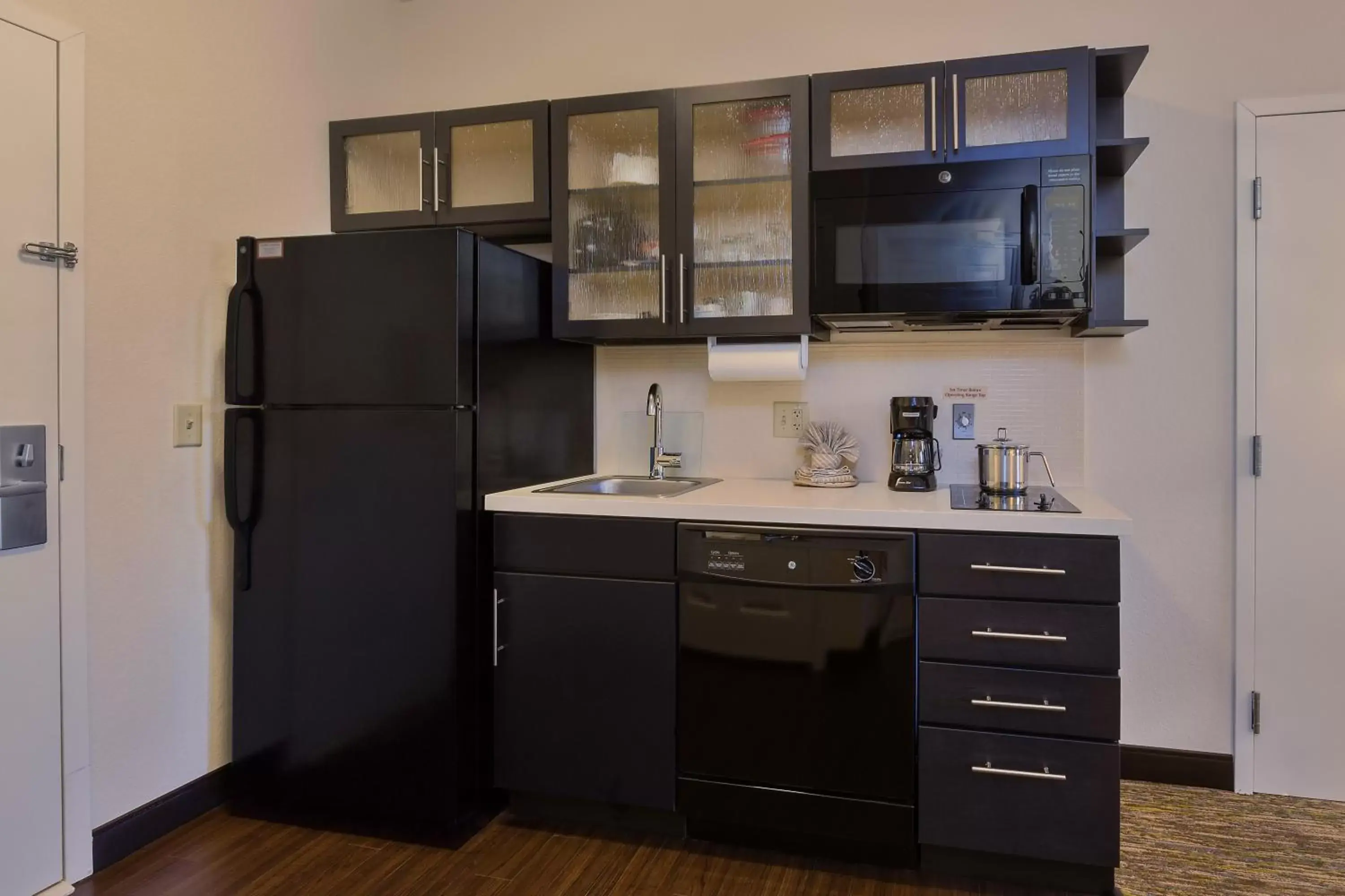 Photo of the whole room, Kitchen/Kitchenette in Candlewood Suites Tucson, an IHG Hotel