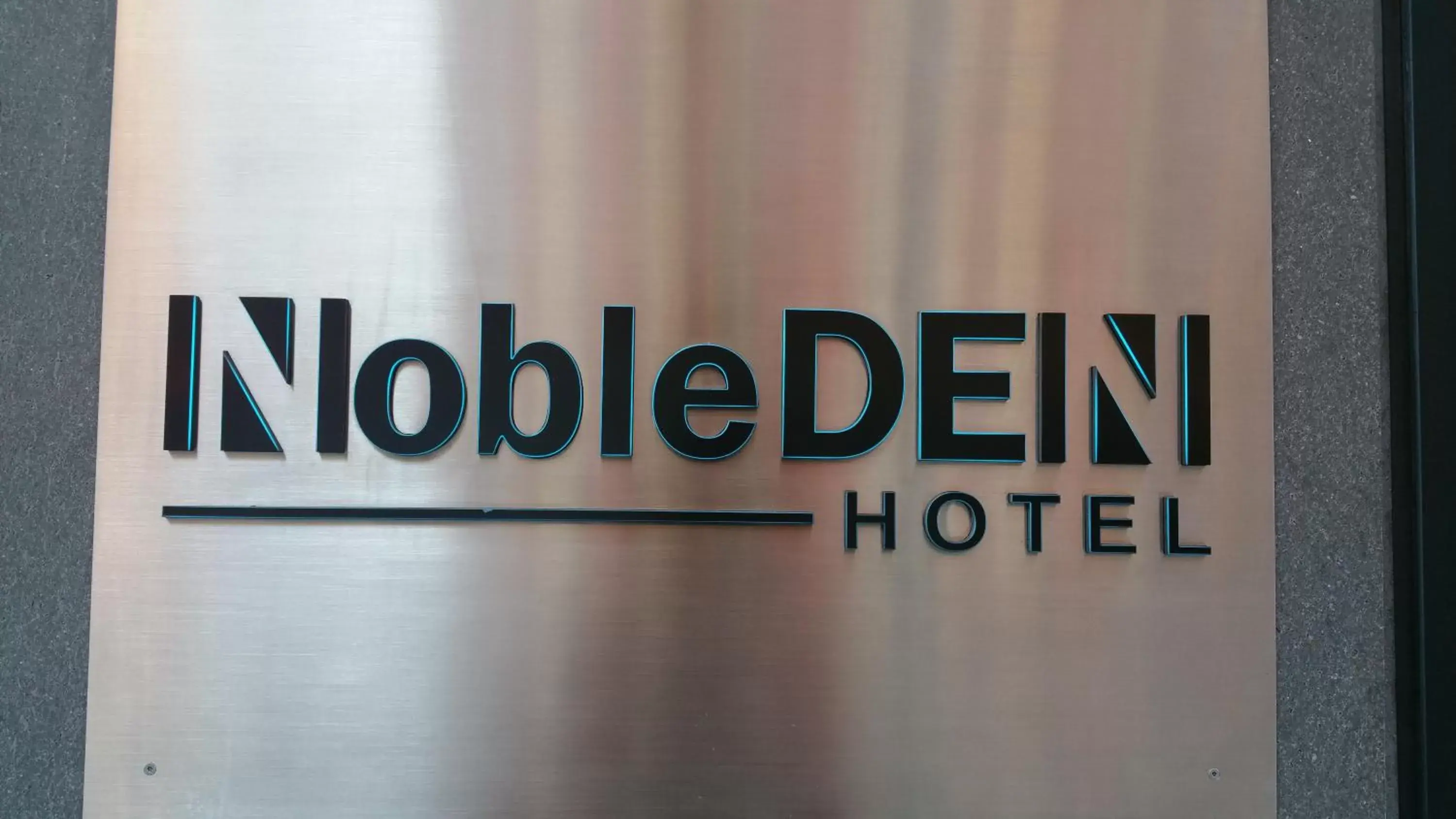 Property logo or sign in NobleDEN Hotel