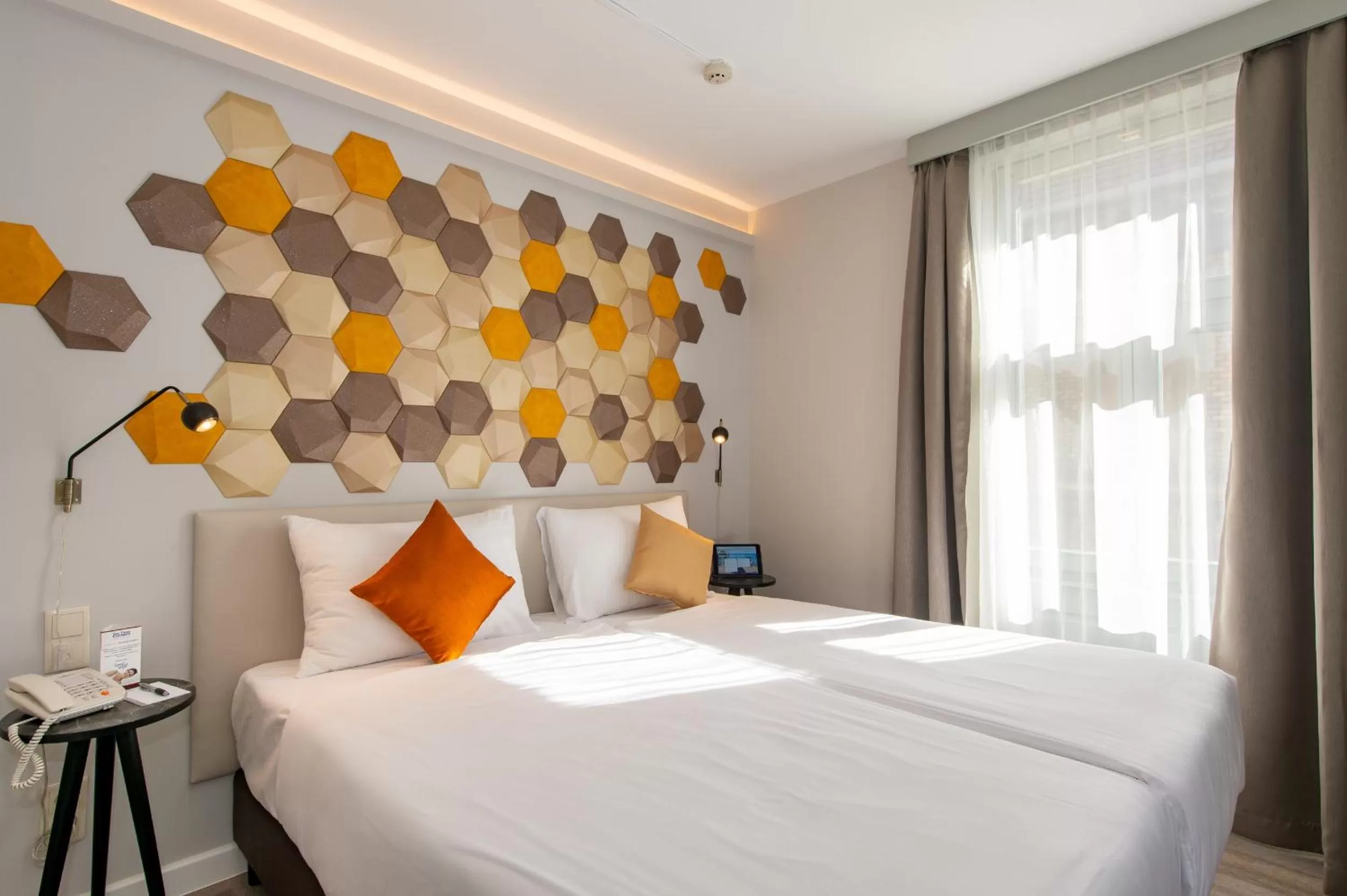 Bed in Three Corners Hotel Art