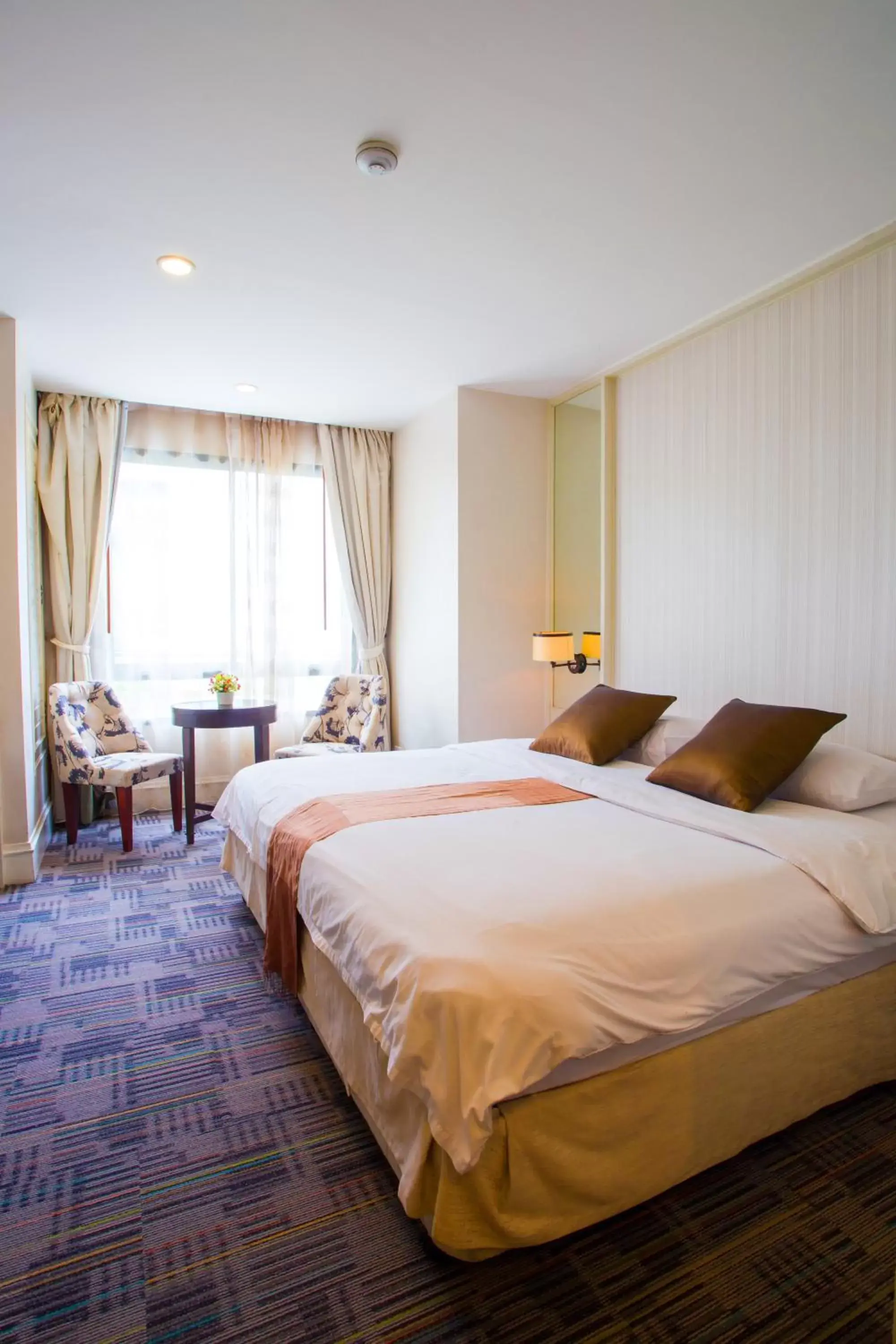 Bed in Aphrodite Inn Bangkok Bed in Aphrodite Inn Bangkok