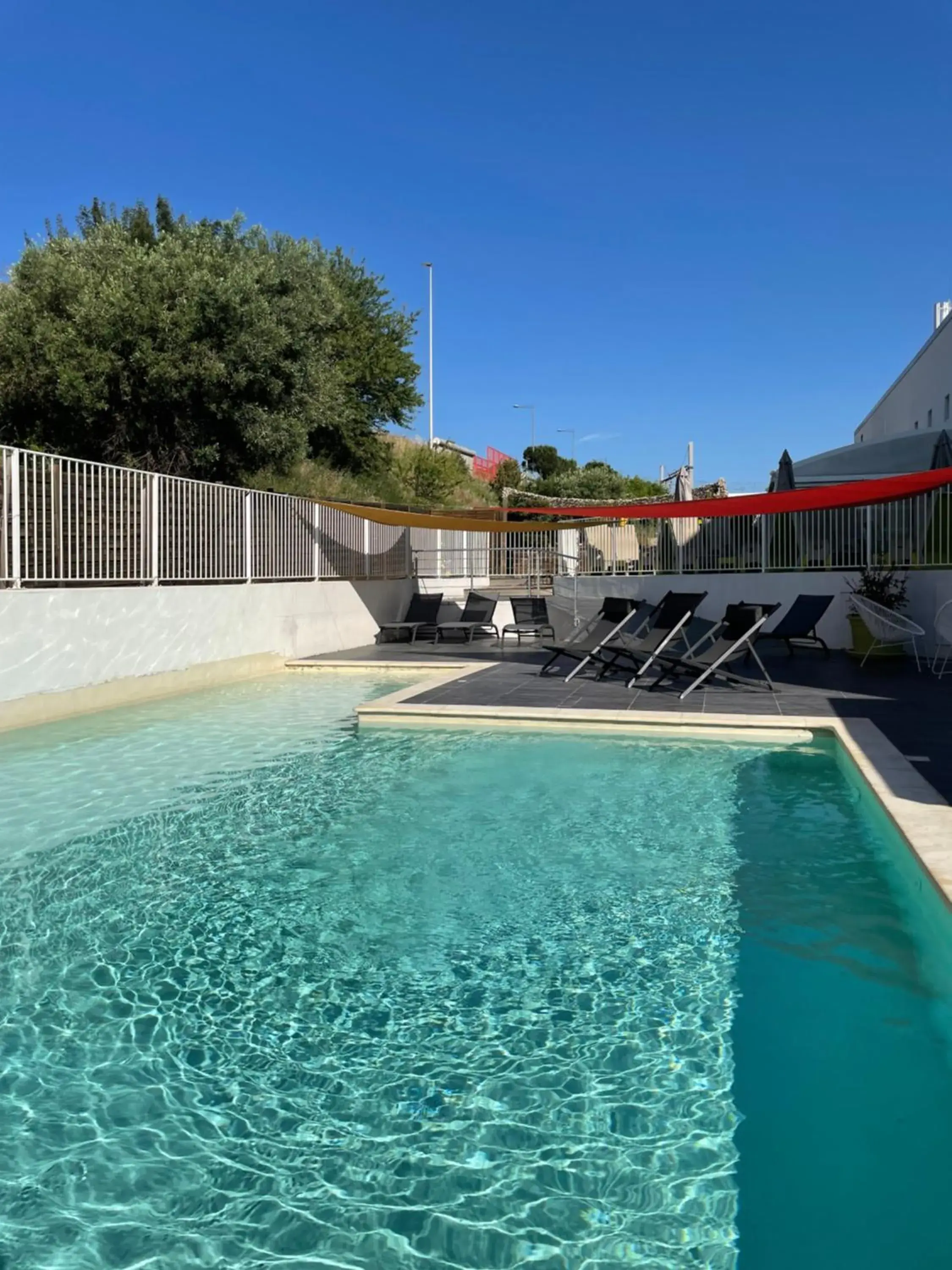 Swimming Pool in Kyriad Prestige Montpellier Ouest - Croix D'argent
