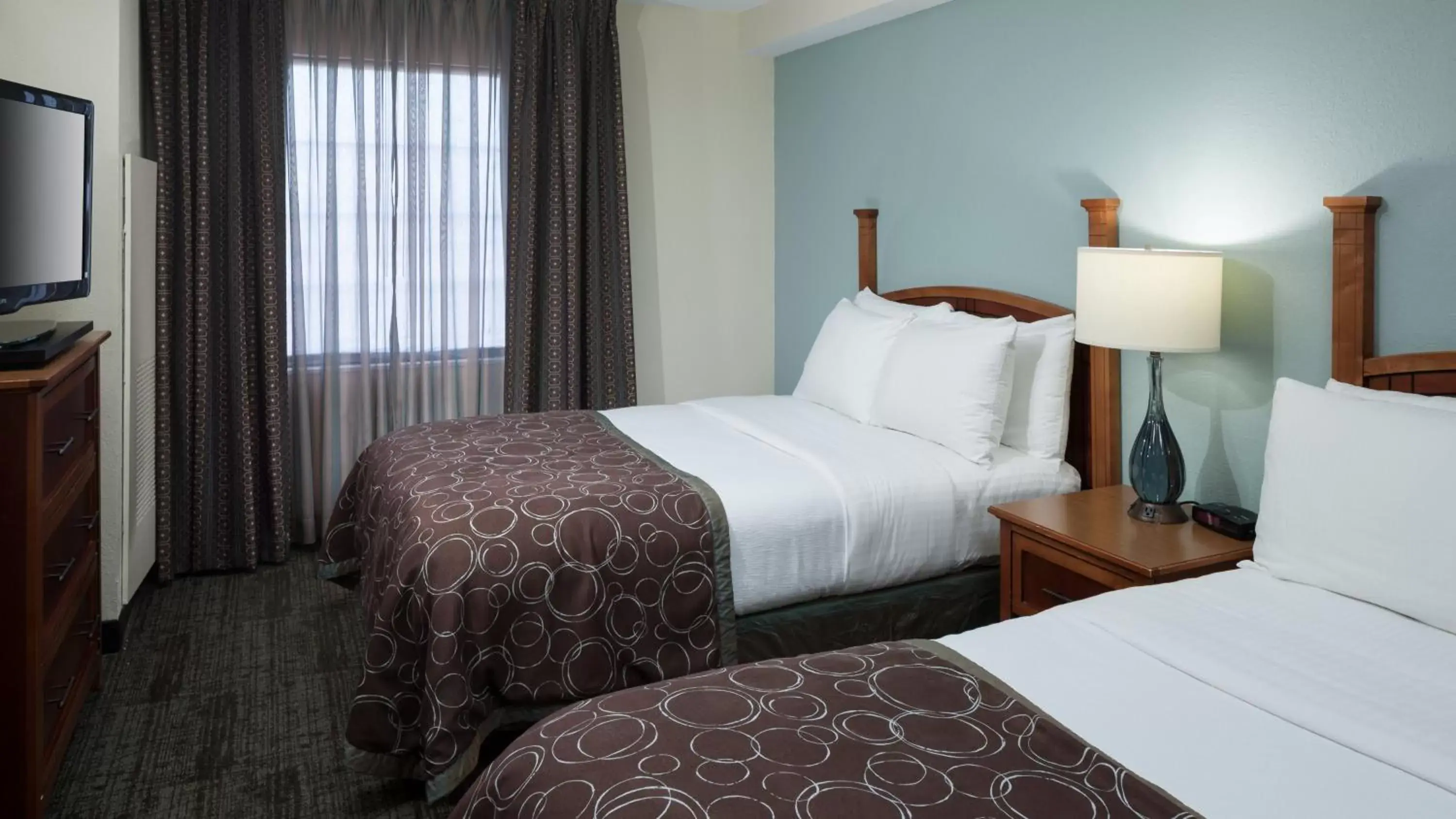 Photo of the whole room, Bed in Staybridge Suites Jackson, an IHG Hotel