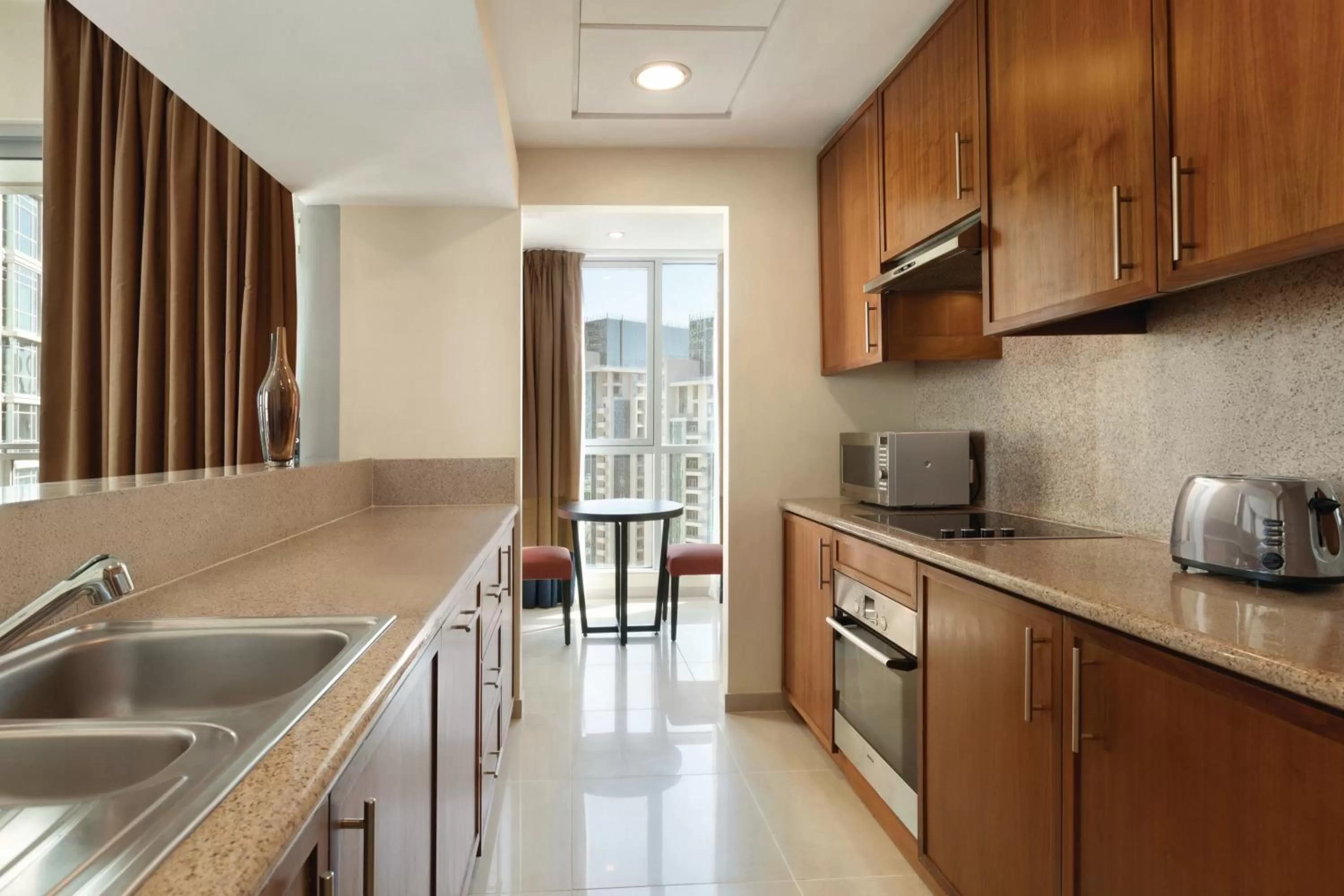 Kitchen or kitchenette in Ramada by Wyndham Downtown Dubai