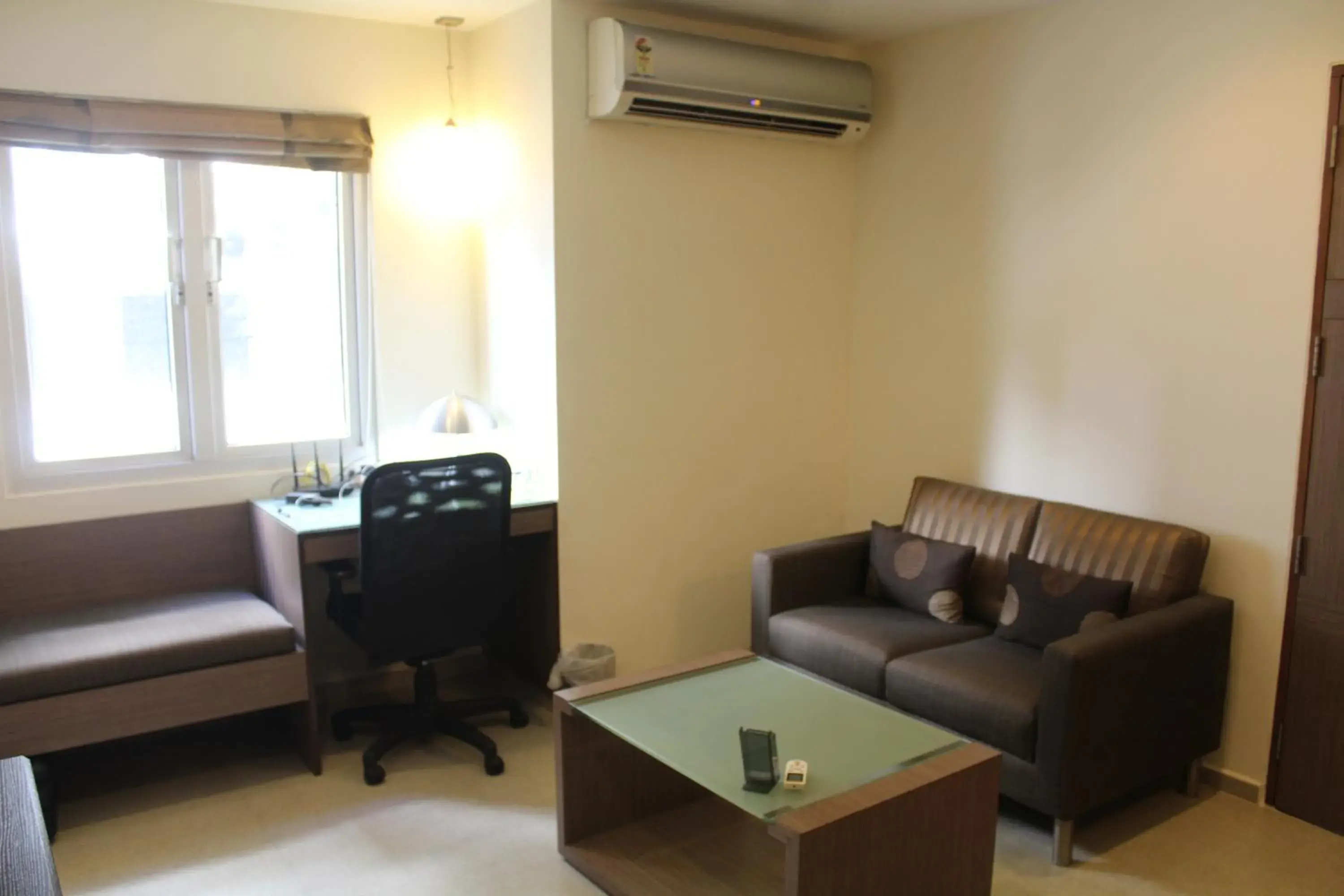 Living room, Seating Area in The Lotus Apartment hotel, Burkit Road