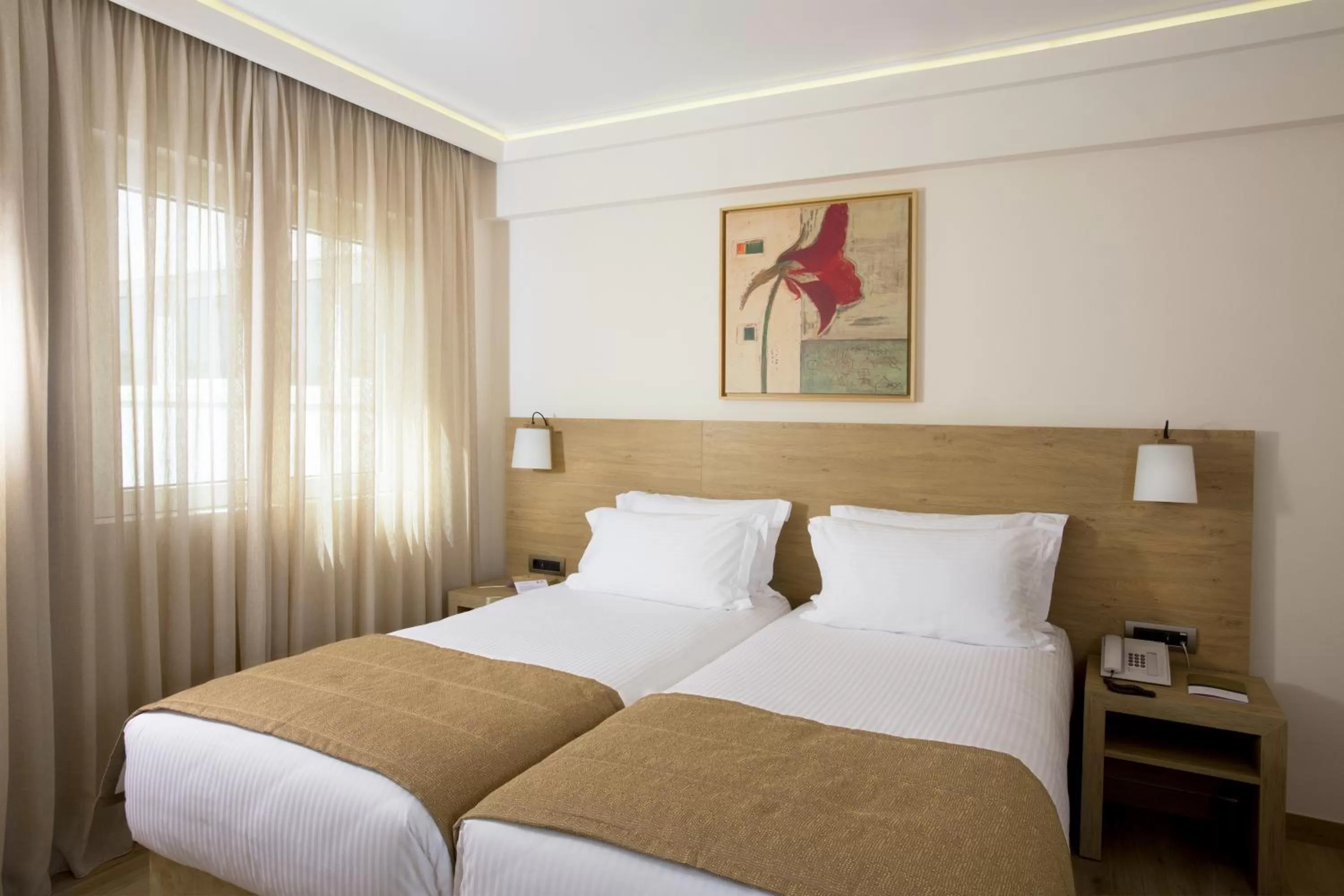 Bed in Golden Age Athens Hotel