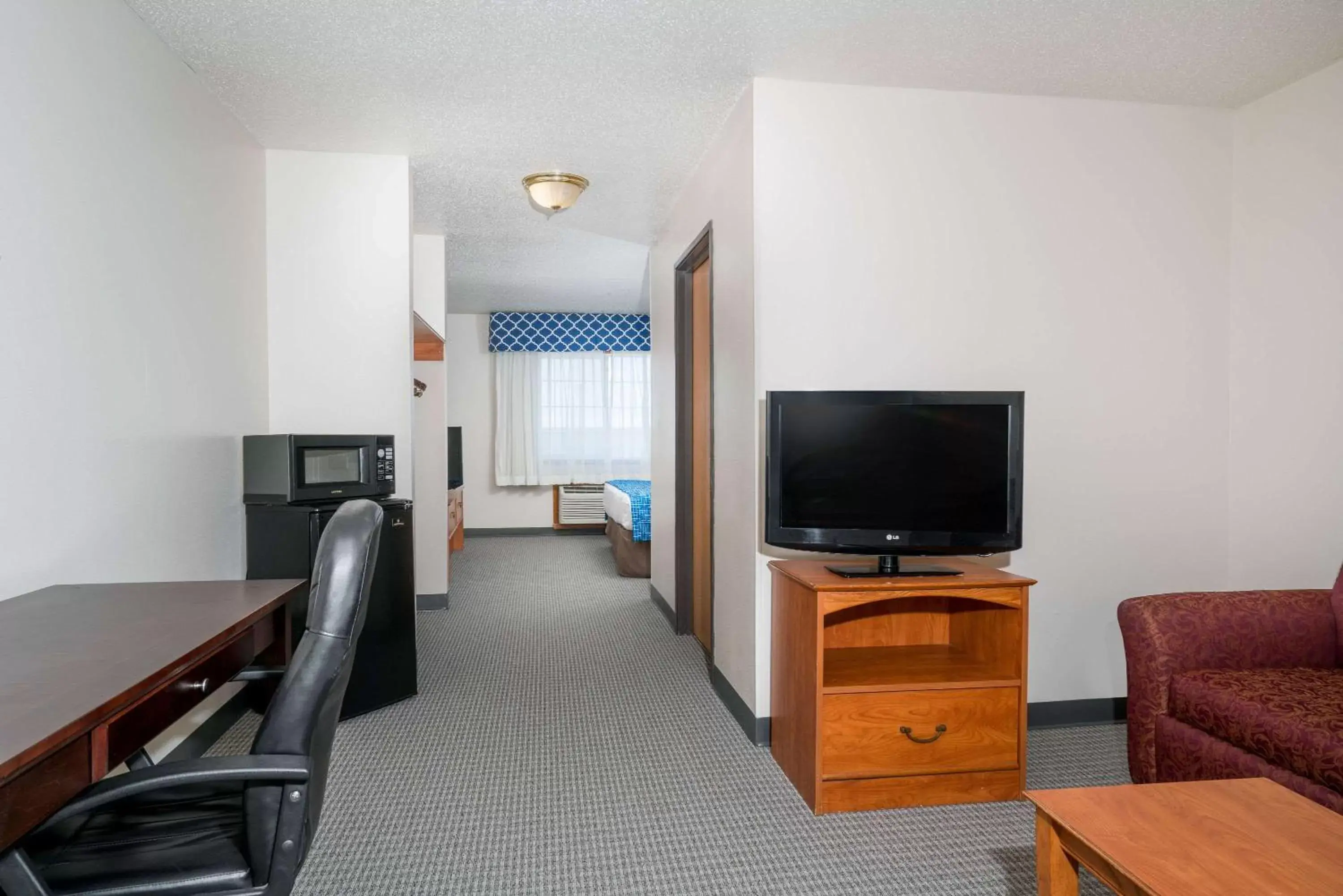 Photo of the whole room, TV/Entertainment Center in Ramada Limited Cockeysville