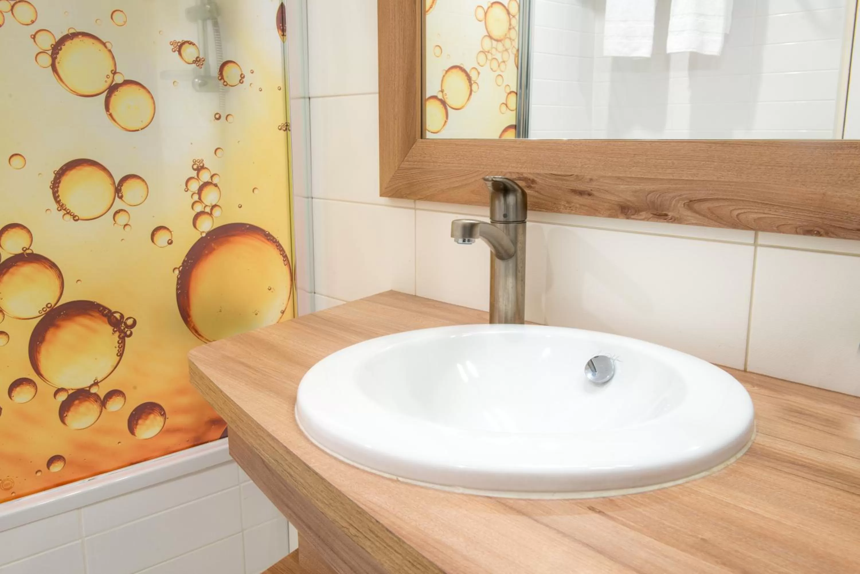 Bathroom in Holiday Inn Reims Centre by IHG