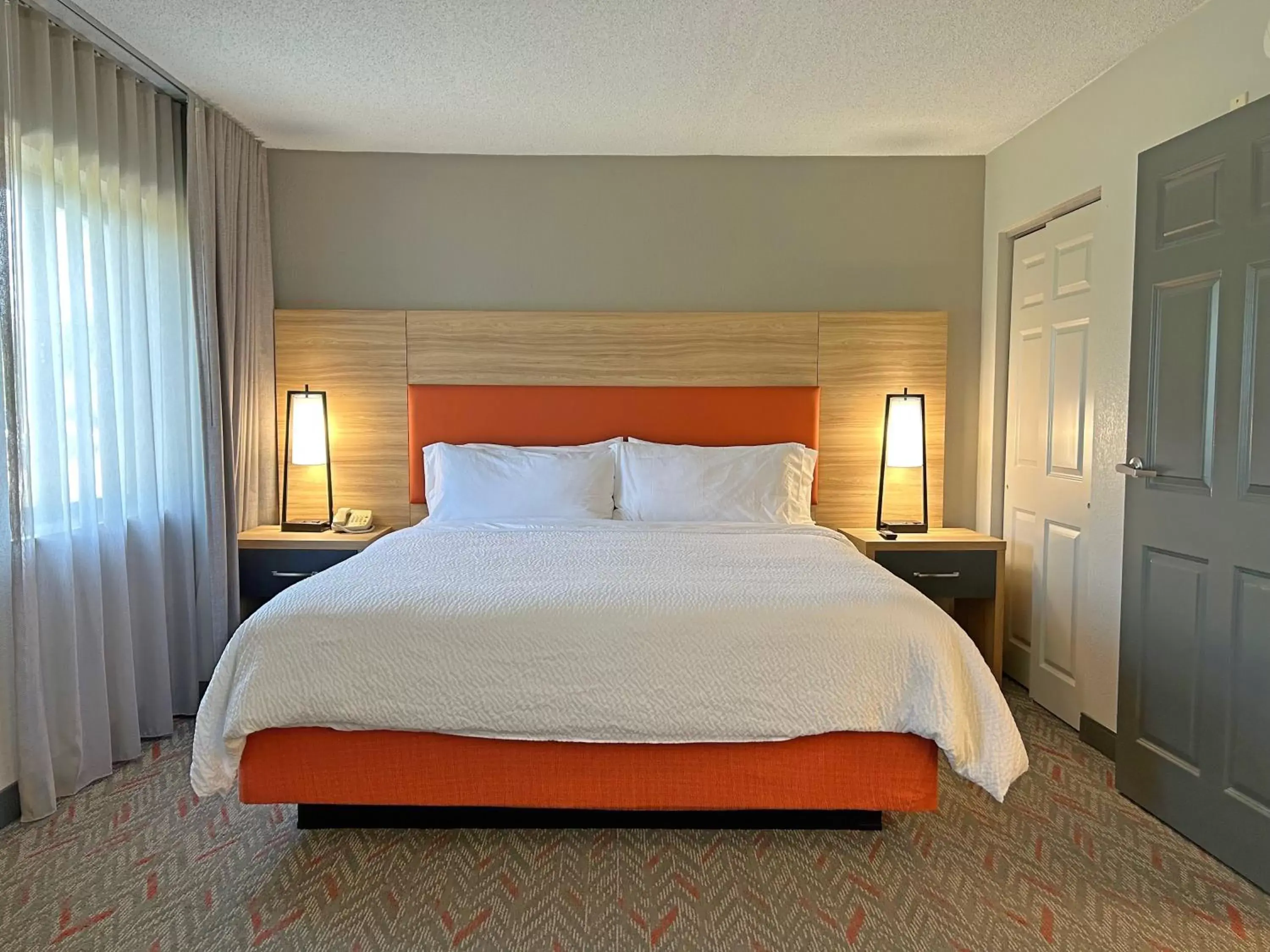 Bed in Candlewood Suites Indianapolis Downtown Medical District, an IHG Hotel