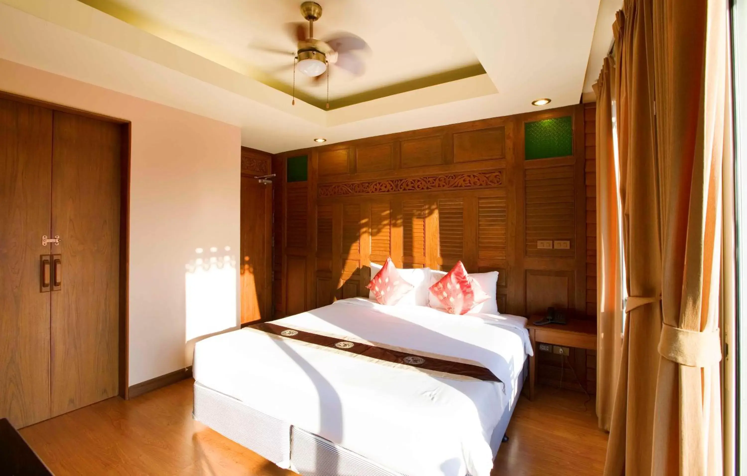 Bed in Lamphu Tree House Boutique Hotel