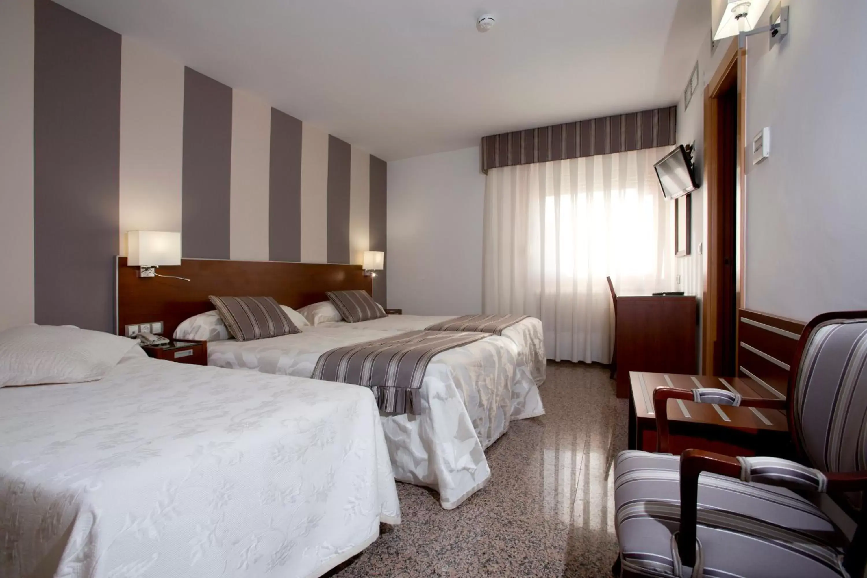 Bed in Hotel Marivella