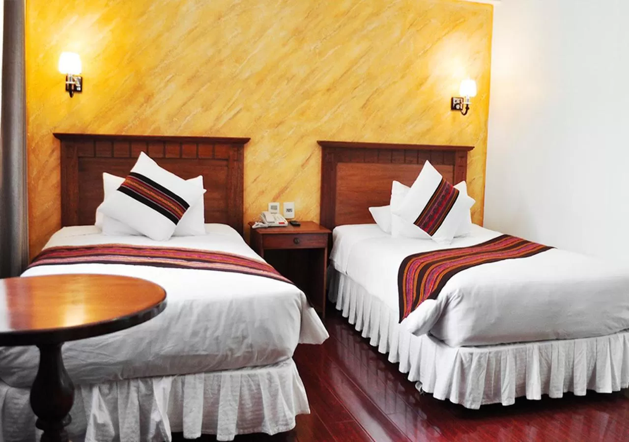 Photo of the whole room, Bed in Qantu Hotel