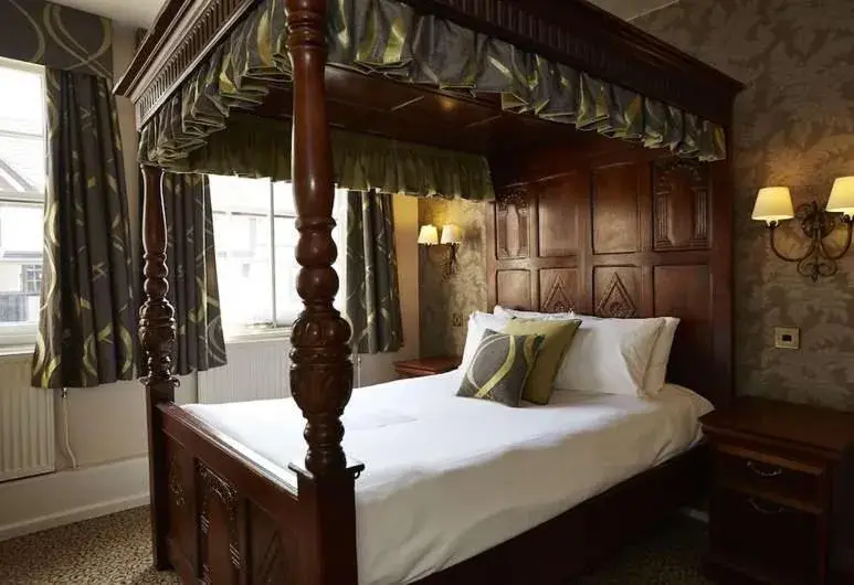 Bed in Ye Olde Talbot Hotel by Greene King Inns