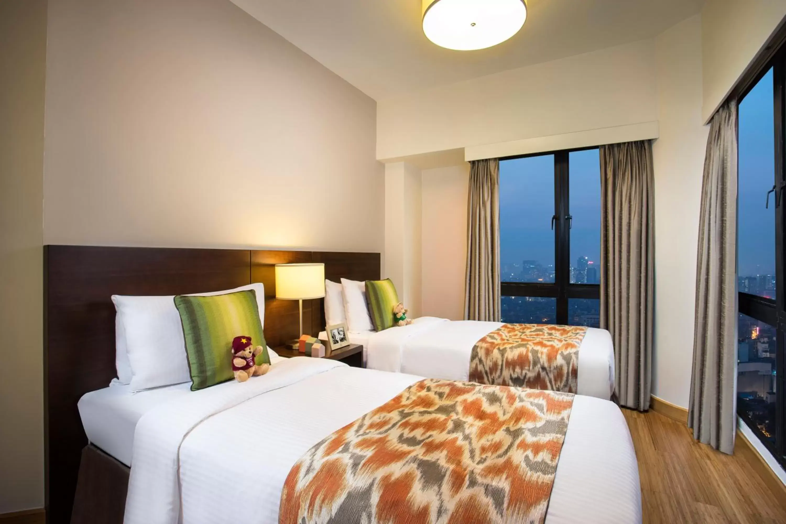 Bed in Somerset Grand Hanoi Serviced Residences