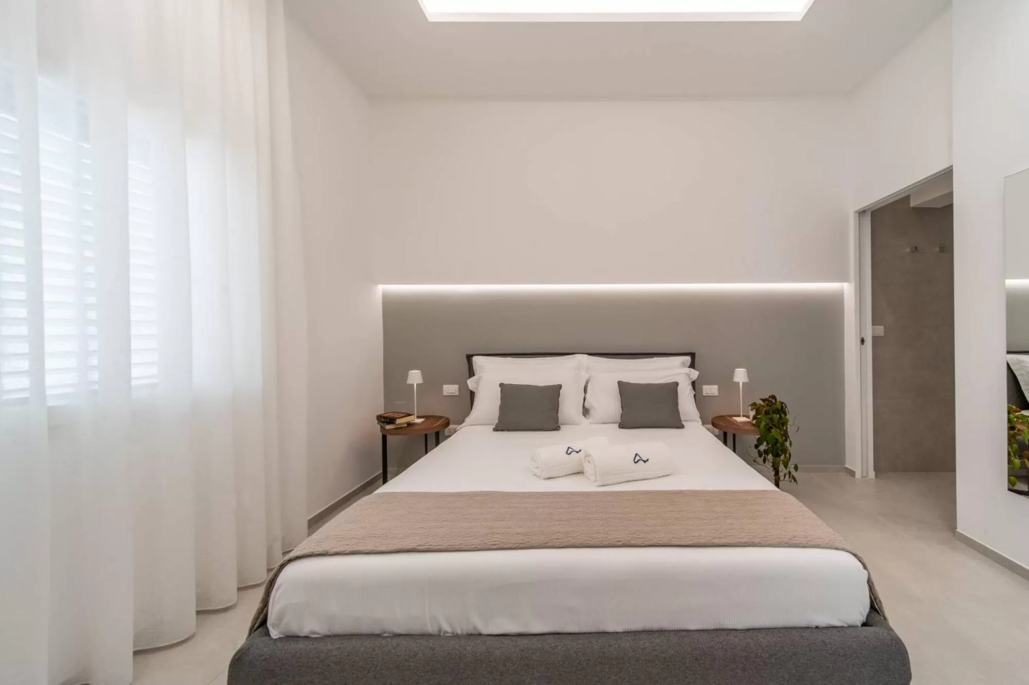 Bed in Daline Holiday Rooms