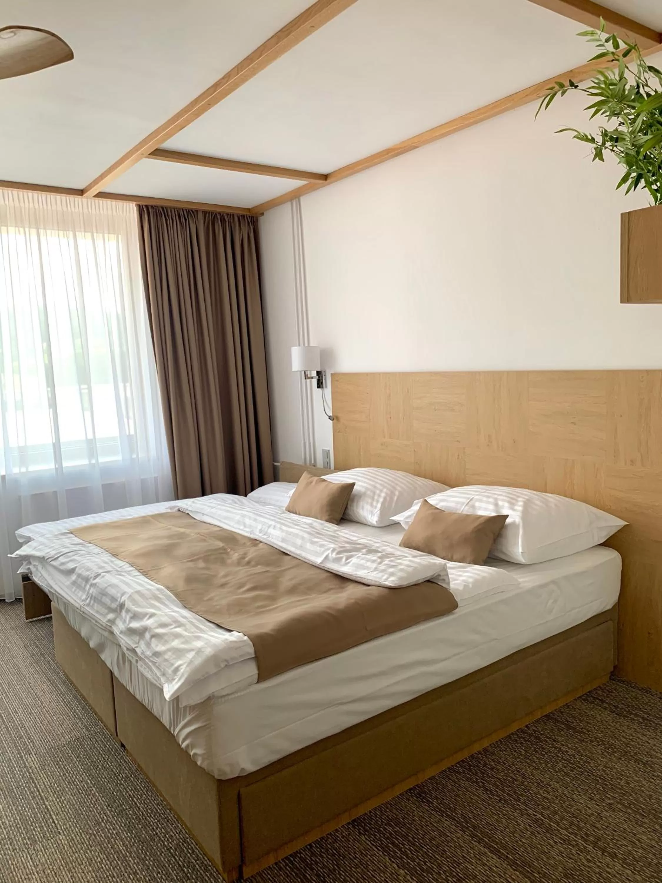 Bed in Hotel Adamantino