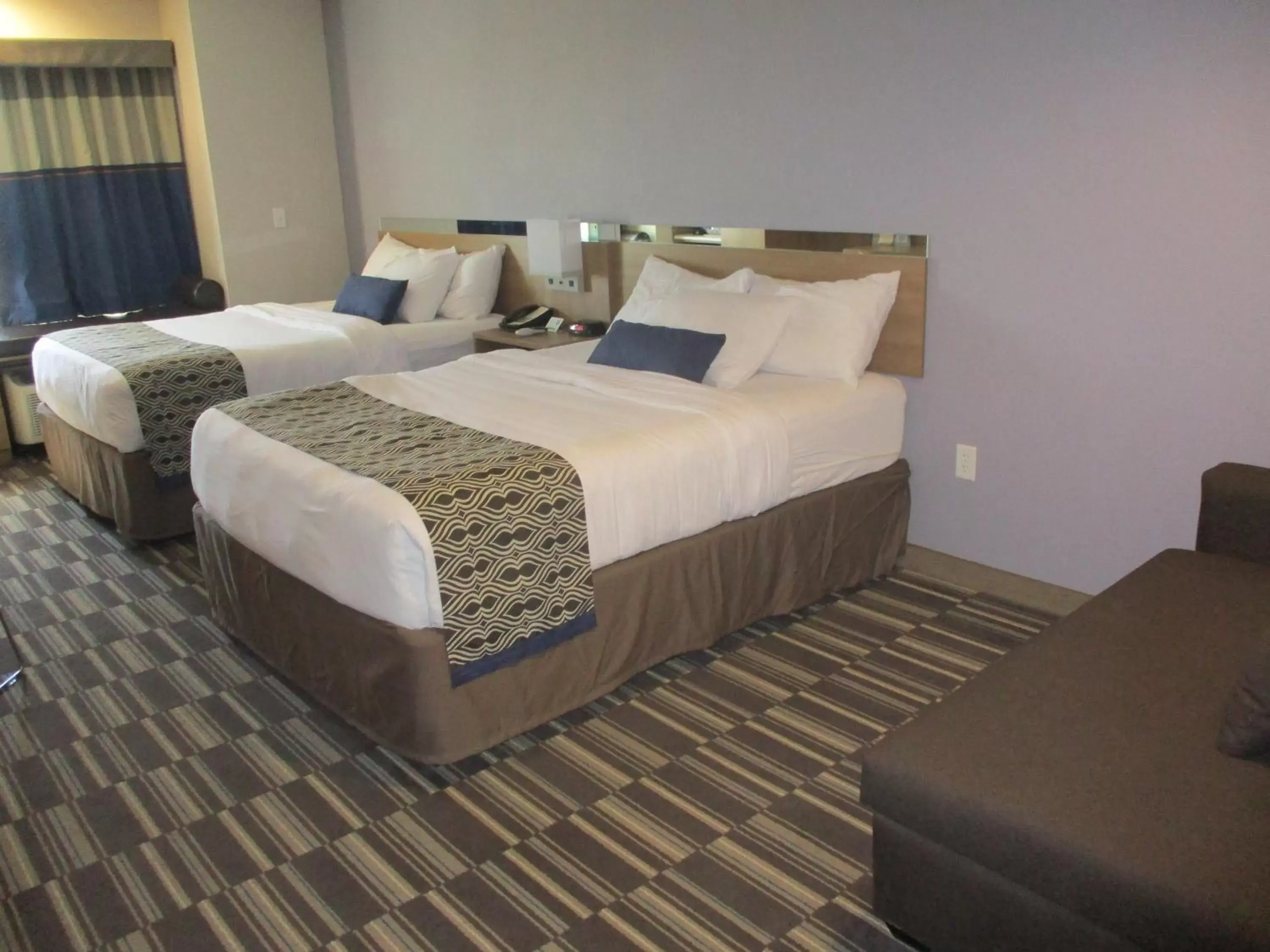 Photo of the whole room, Bed in Microtel Inn & Suites by Wyndham Vernal/Naples