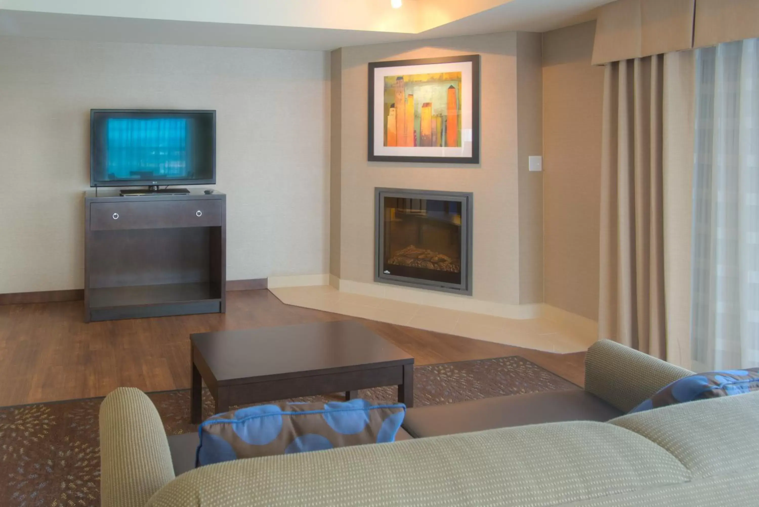 Photo of the whole room, TV/Entertainment Center in Holiday Inn Express & Suites Tacoma Downtown, an IHG Hotel