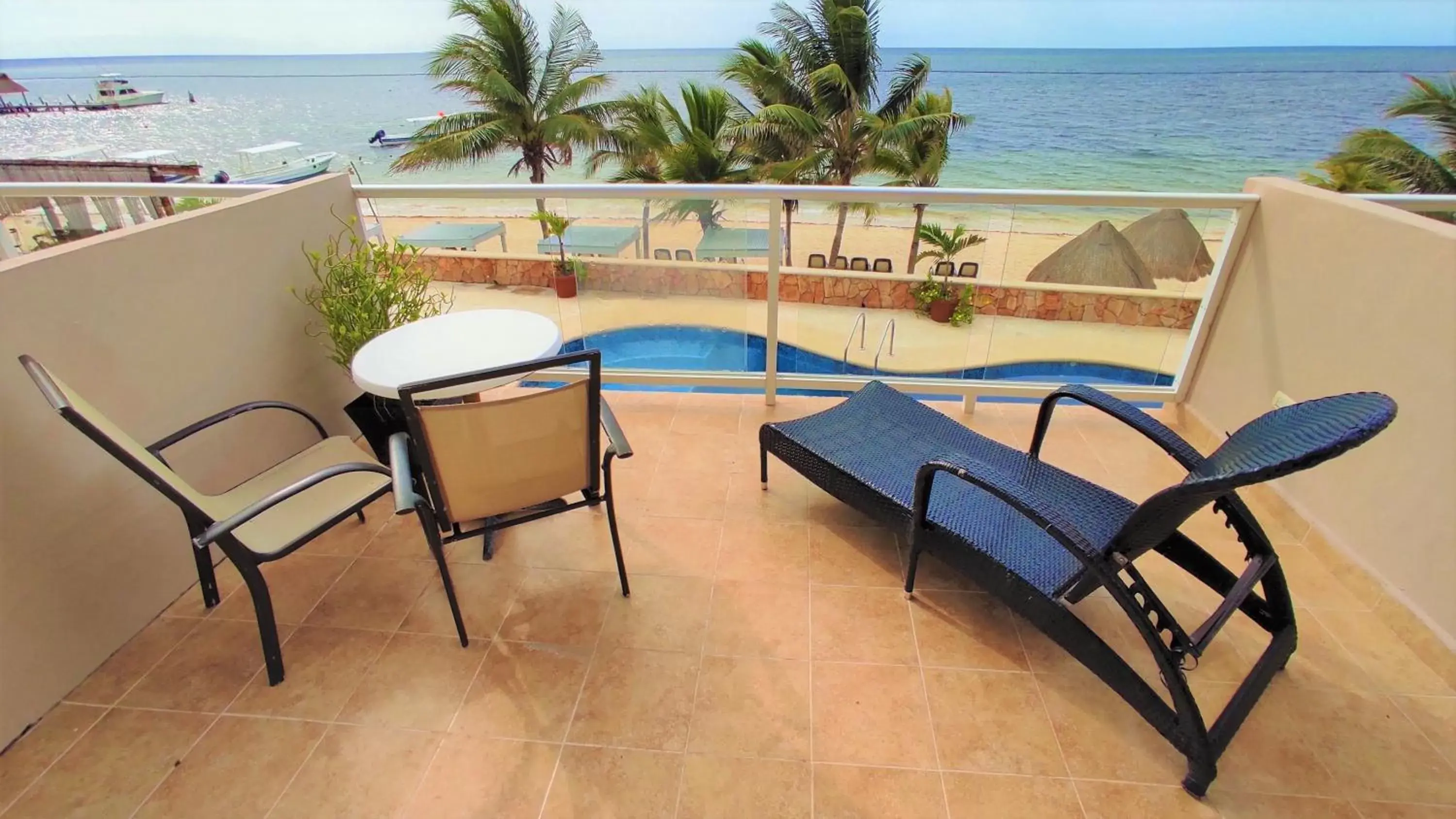 Balcony/Terrace, Swimming Pool in Hacienda Morelos Beachfront Hotel