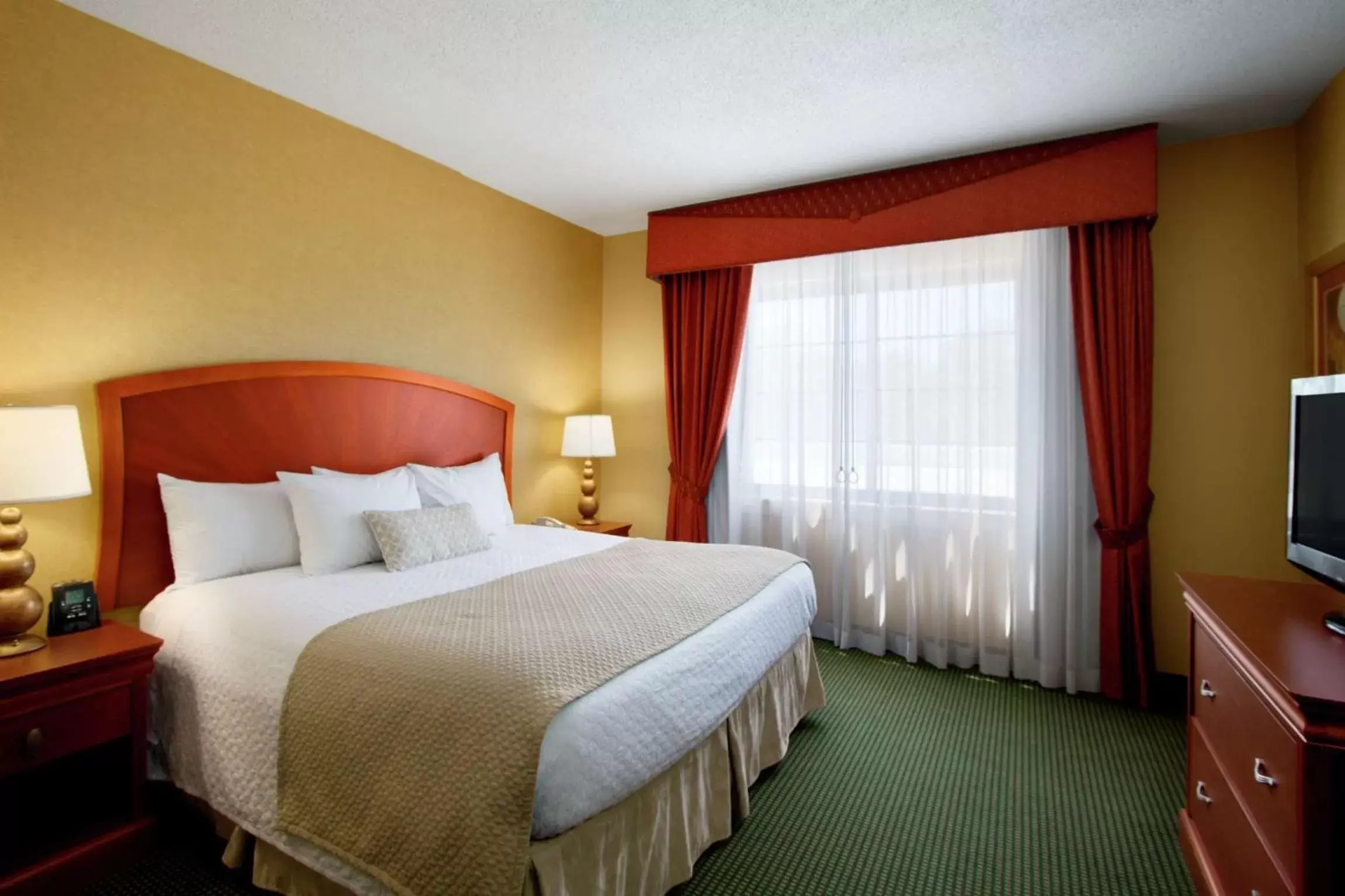 Bed in Embassy Suites by Hilton Greensboro Airport