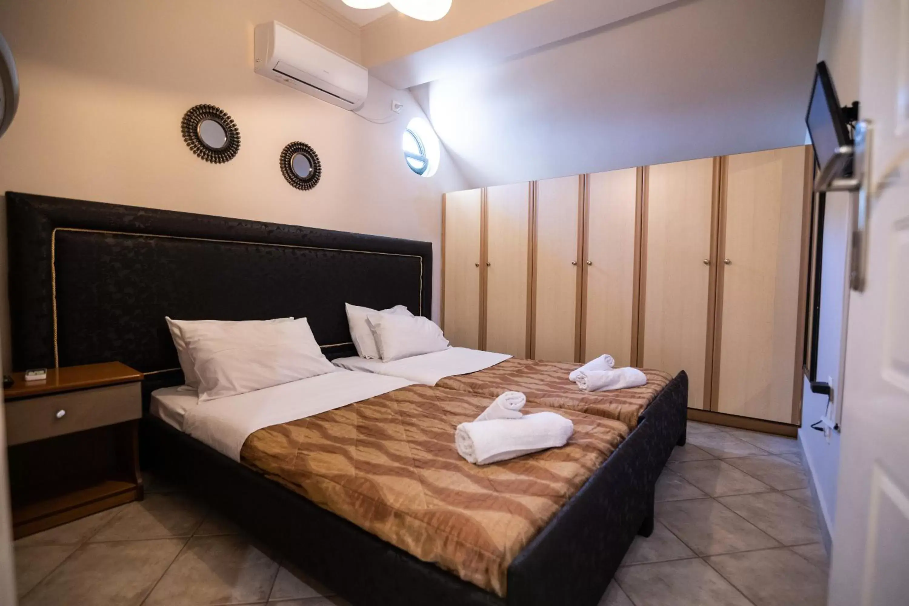 Bed in Votsalakia Hotel & Suites