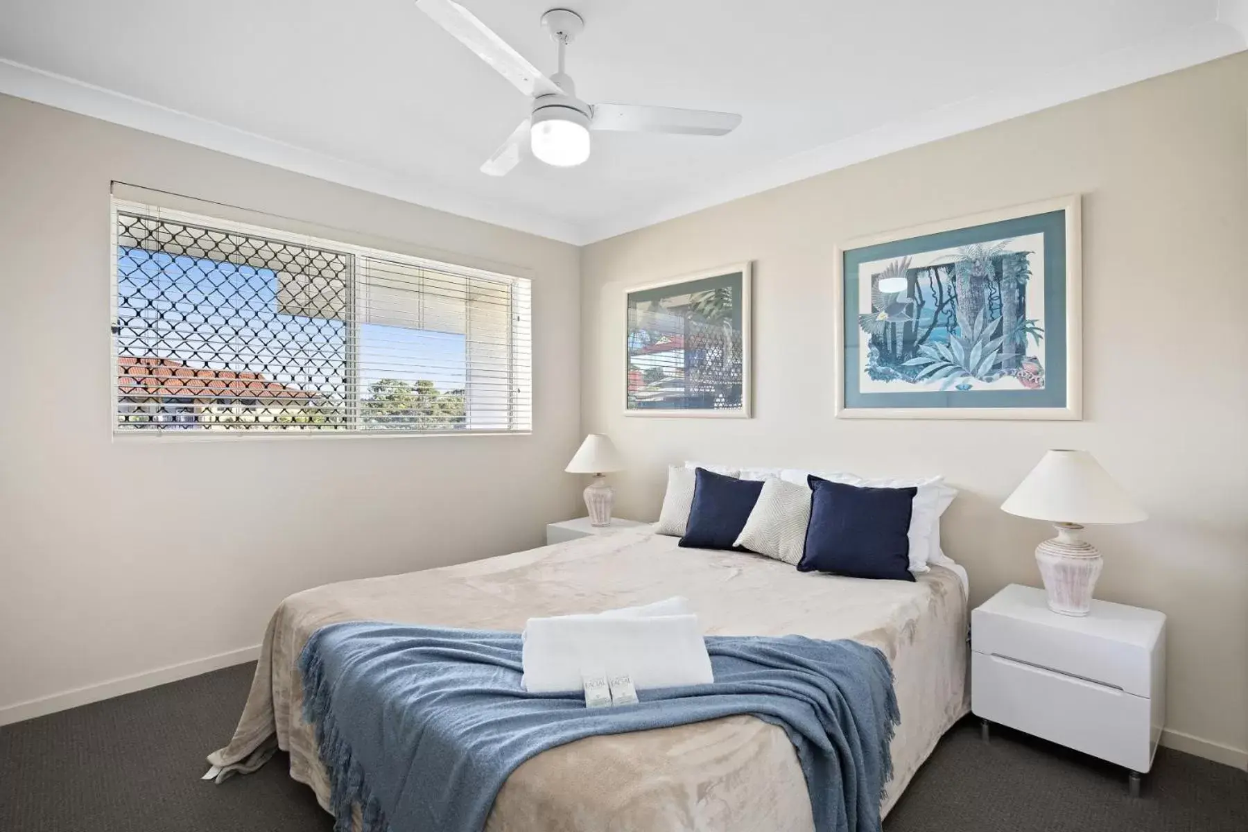 Bed in Kirra Palms Holiday Apartments