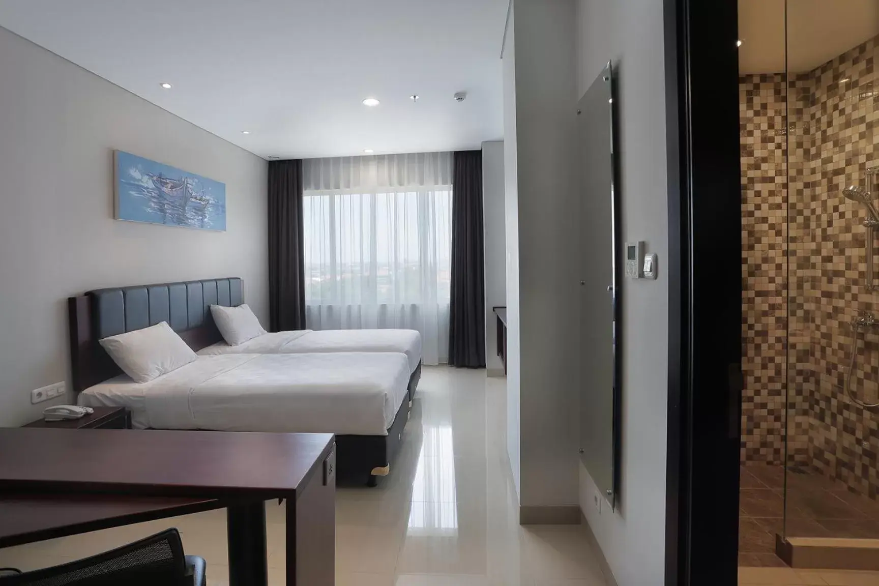 Bedroom in PrimeBiz Hotel Surabaya