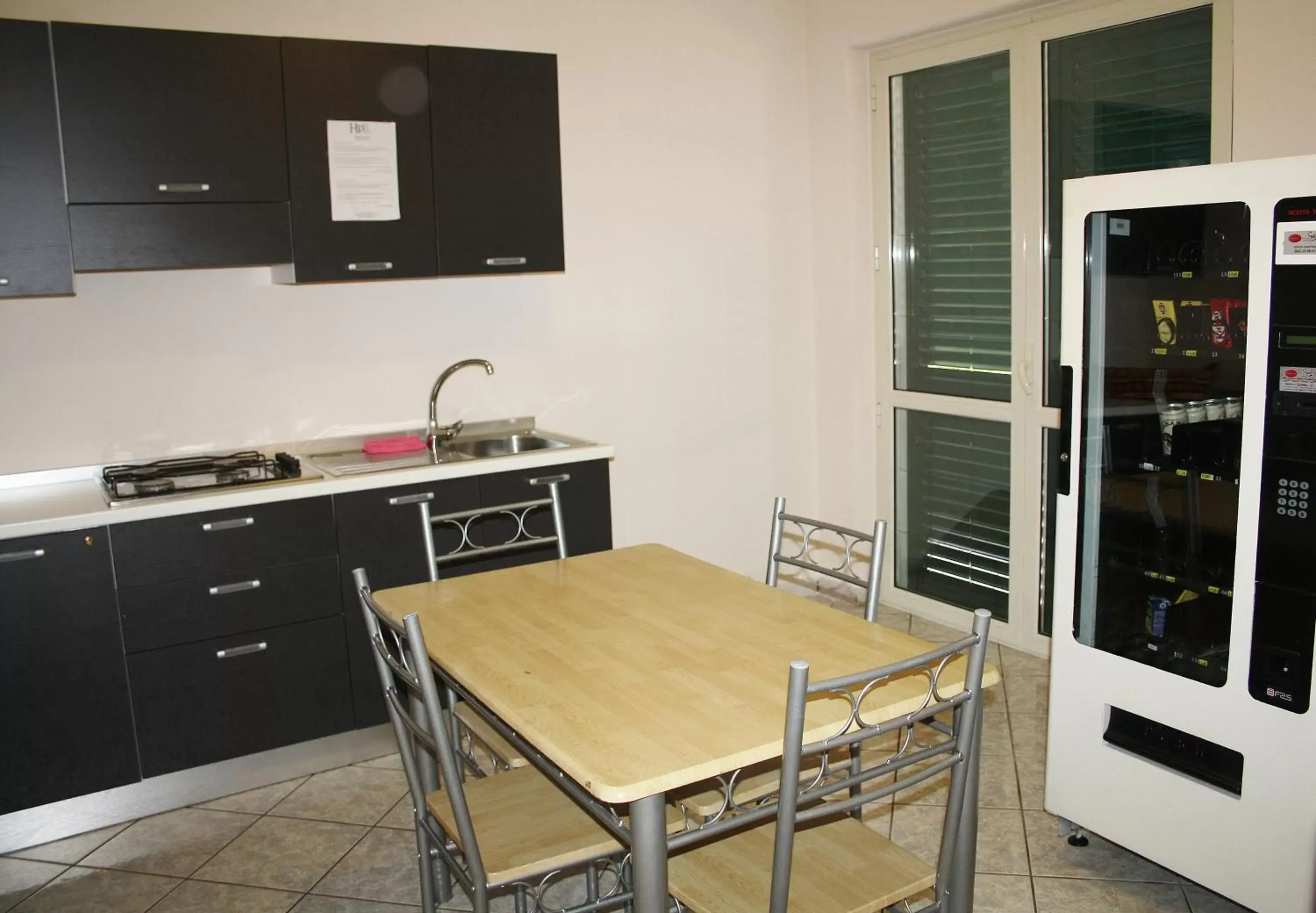 Kitchen/Kitchenette in B&B Paradiso