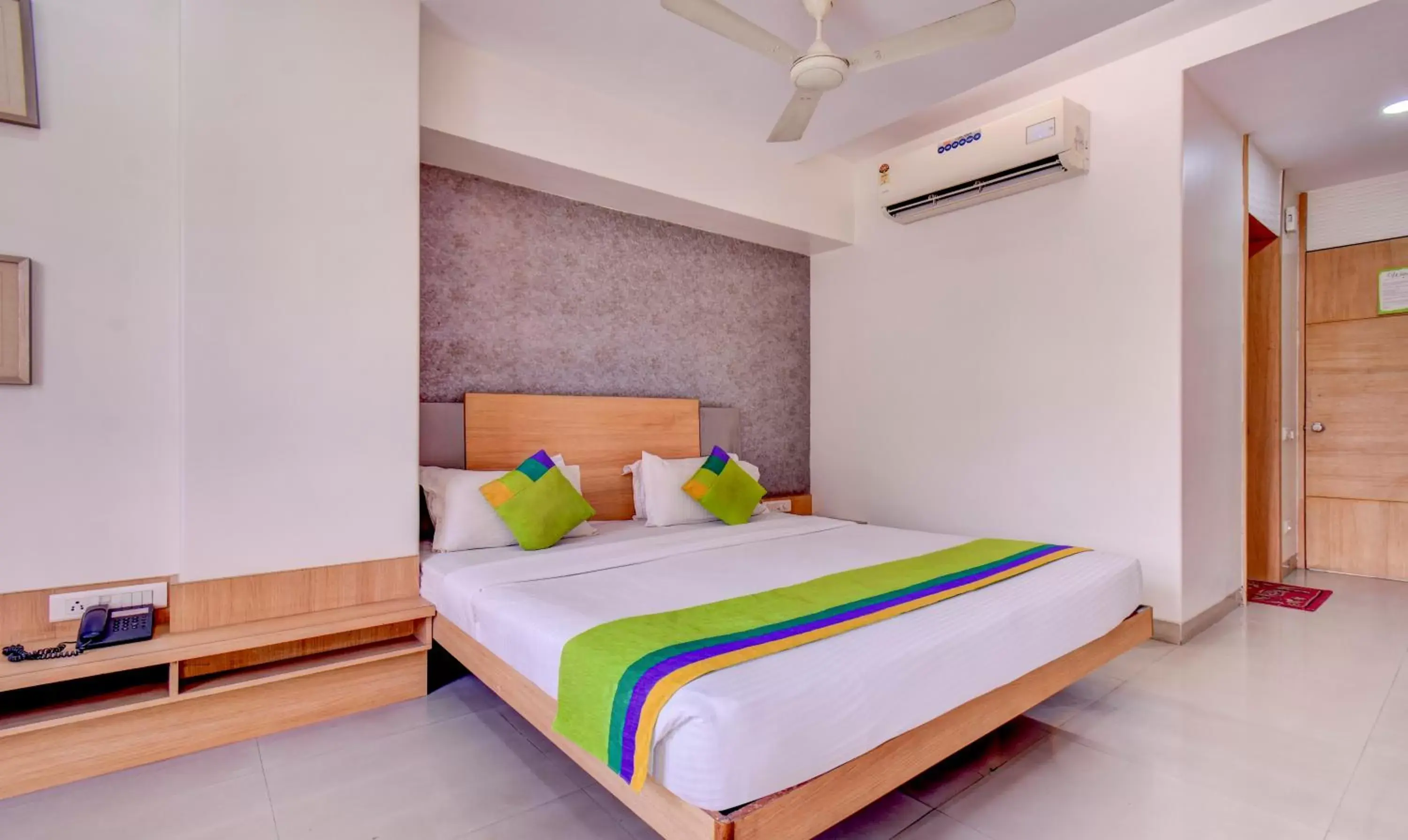 Photo of the whole room, Bed in Treebo Trend Admiral Suites New Usmanpura