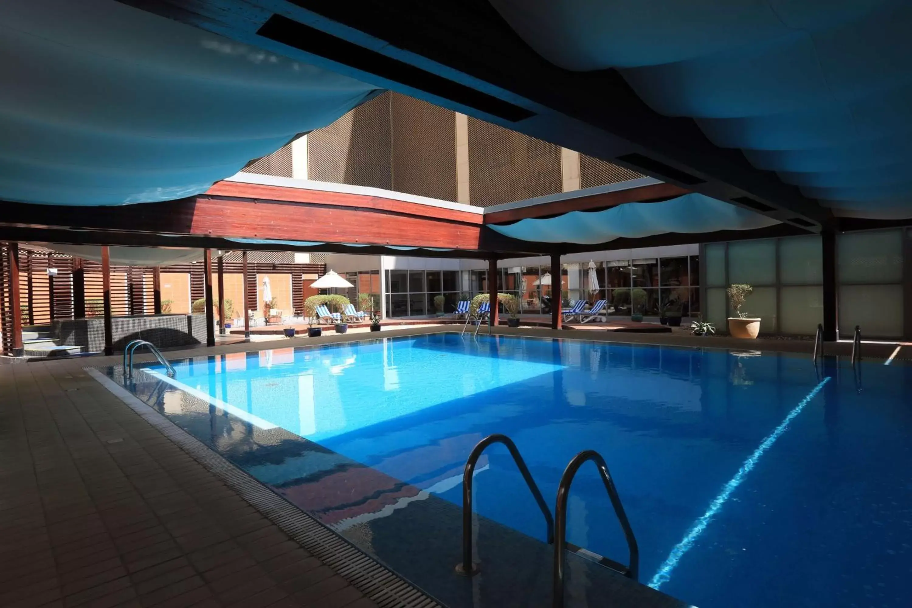 Property building, Swimming Pool in Radisson Blu Hotel, Riyadh