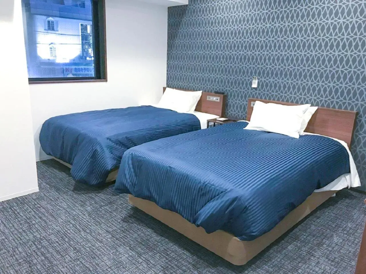 Bed in HOTEL LiVEMAX Shinjuku Kabukicho-Meijidori
