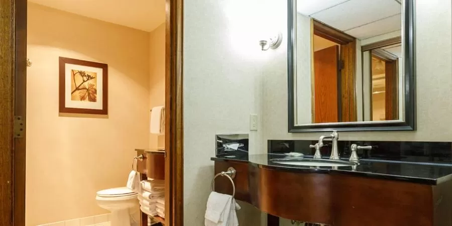 Toilet in Maverick Hotel and Casino by Red Lion Hotels