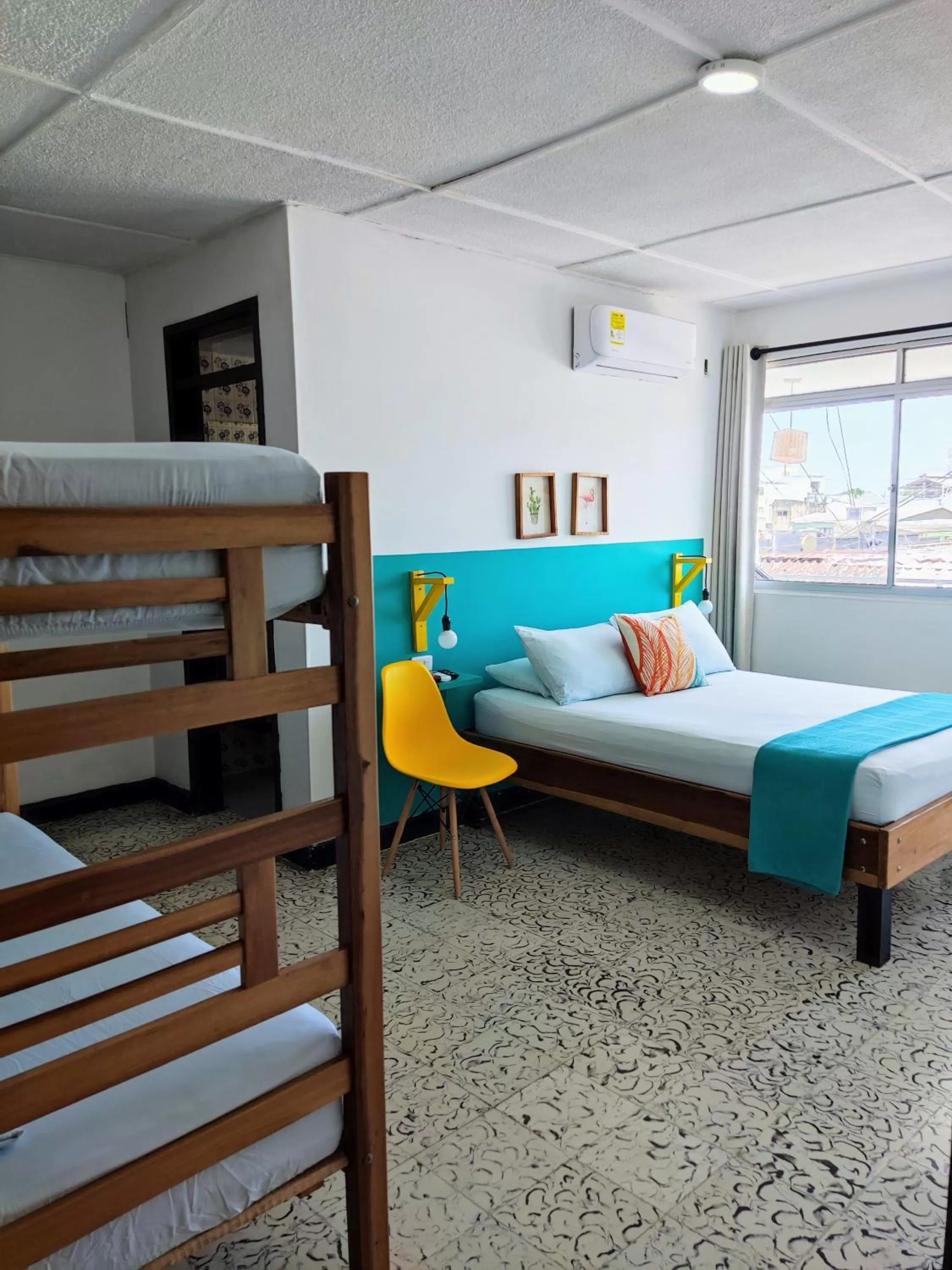 Bed in Bona Vida Hotel