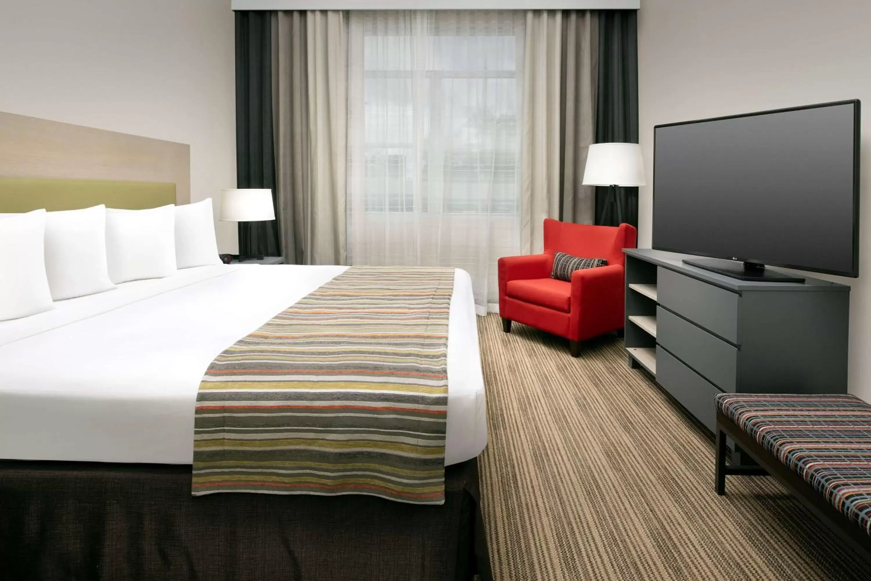 Photo of the whole room, Bed in Country Inn & Suites by Radisson, Houston Intercontinental Airport East, TX