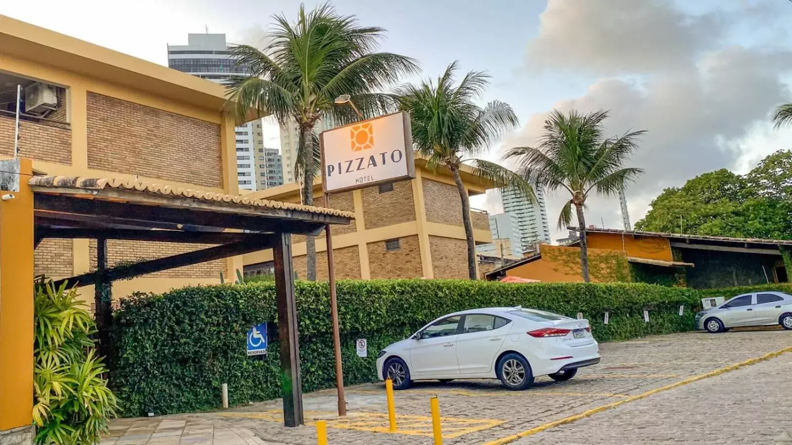 Parking, Property Building in Pizzato Praia Hotel