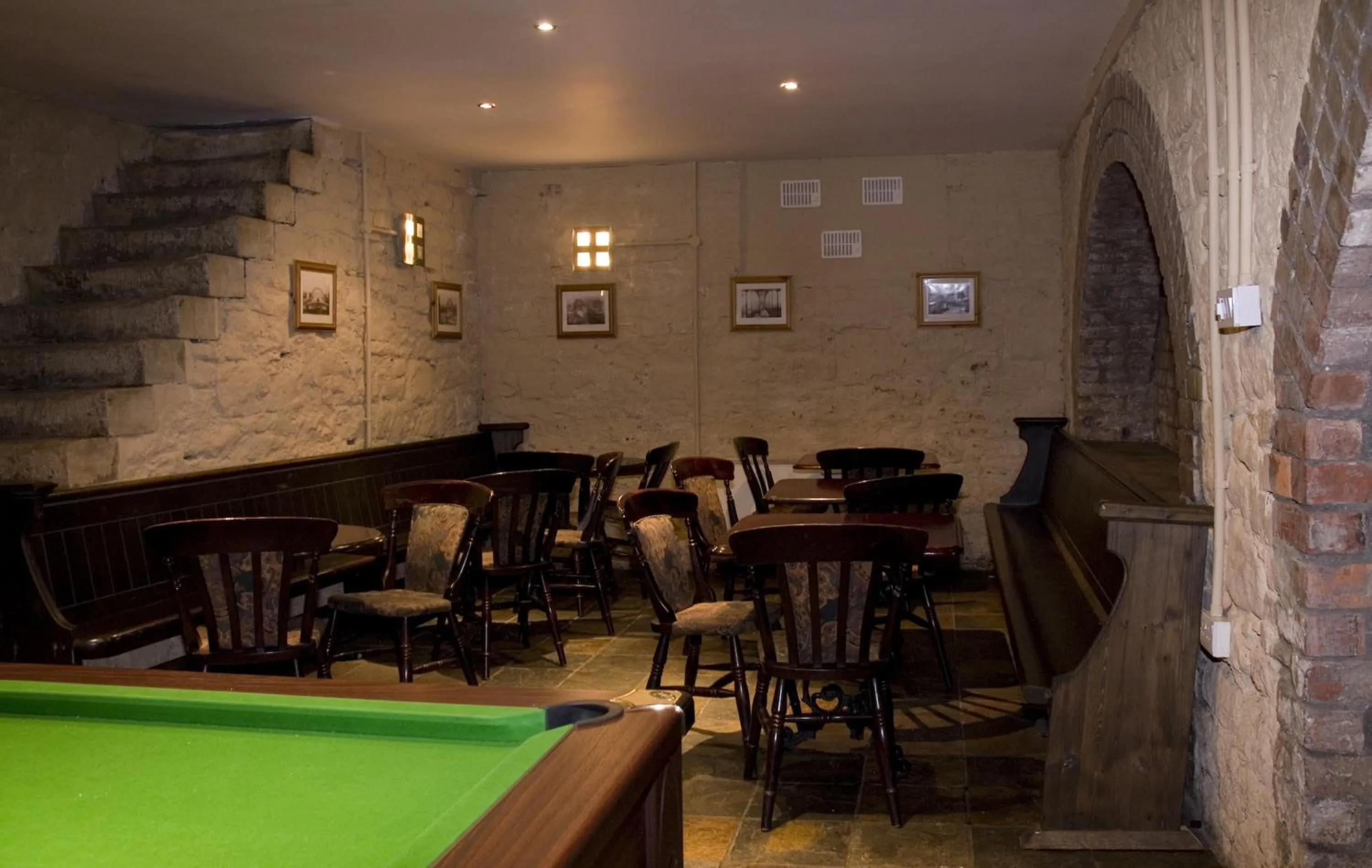 Communal lounge/ TV room in Albatross Hostel