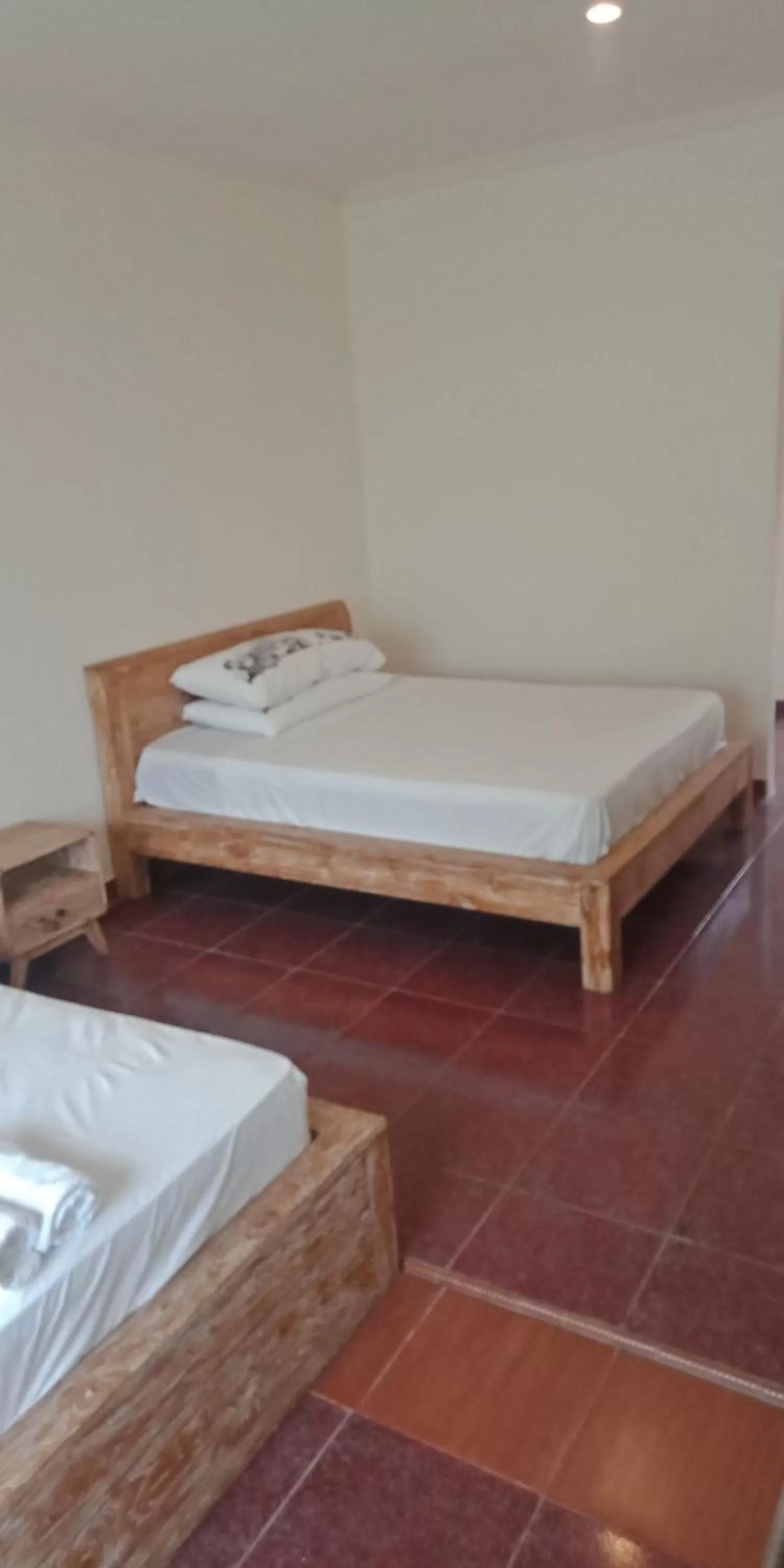 Bed in Nirwana Sea Side Cottages