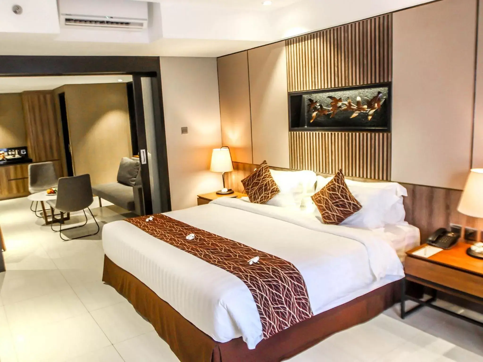 Bed in The Nest Hotel Nusa Dua