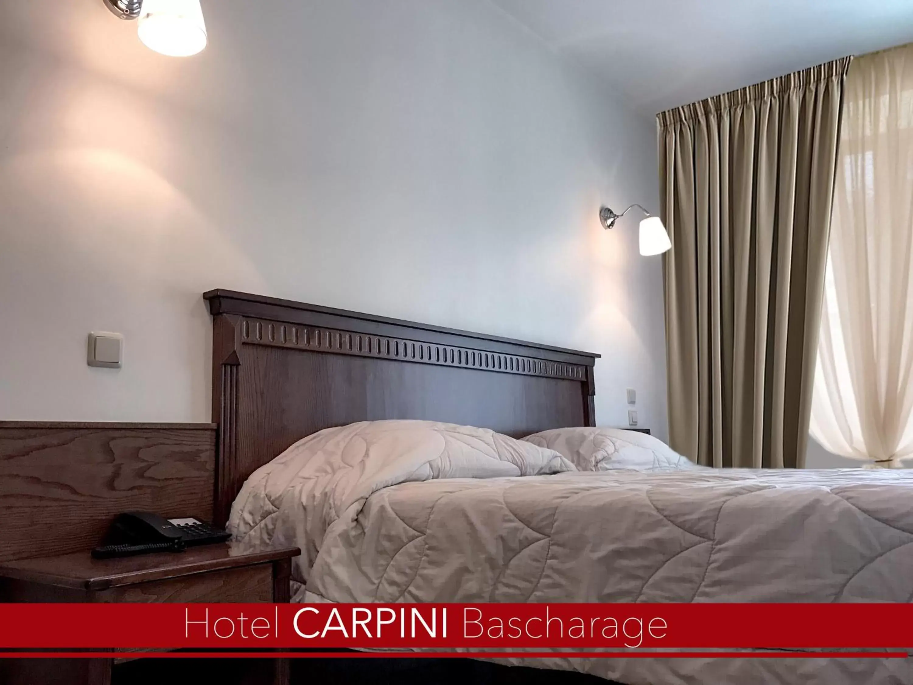 Bed in Hotel Carpini