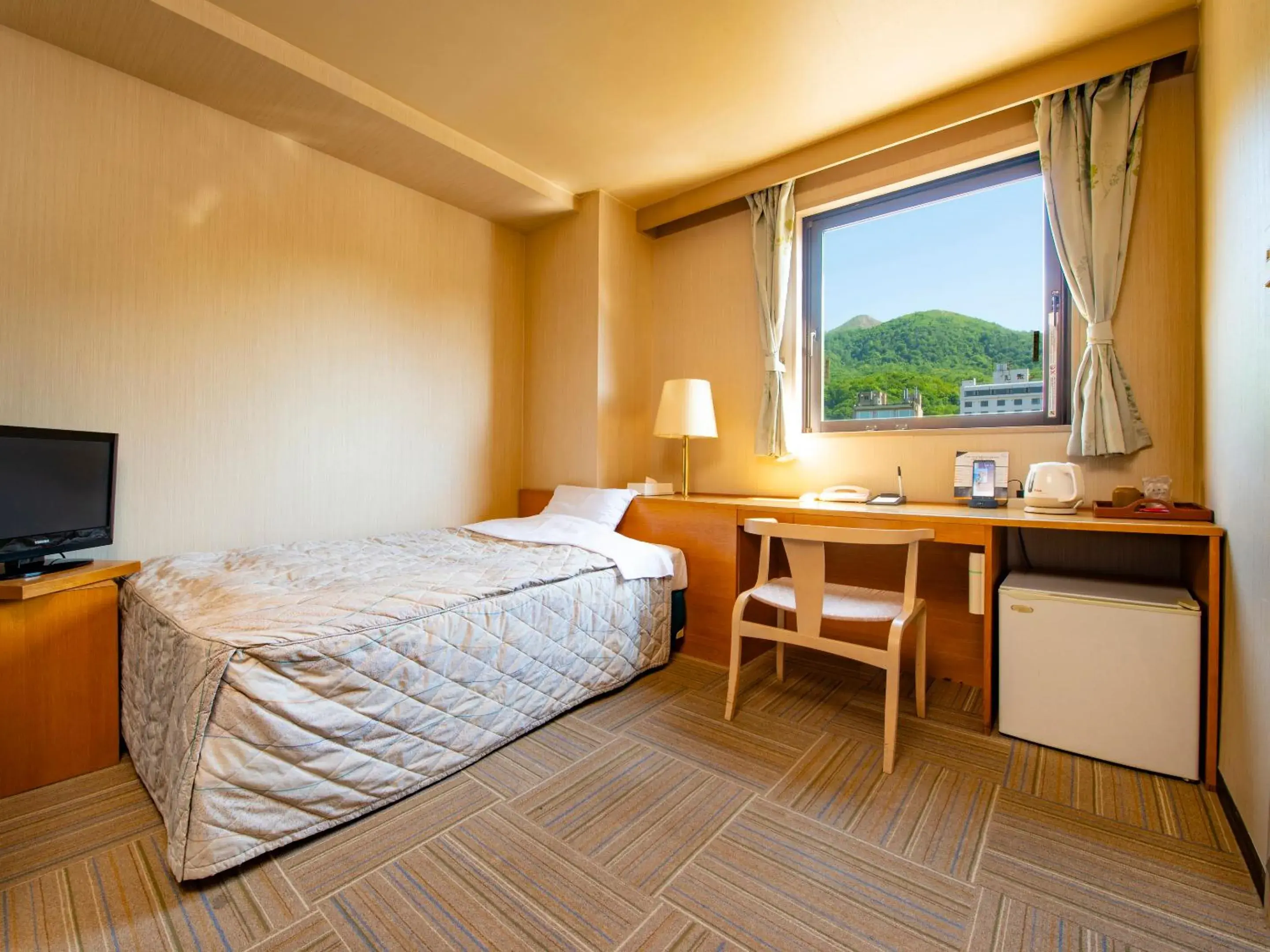 Photo of the whole room, Bed in Toyako Manseikaku Hotel Lakeside Terrace