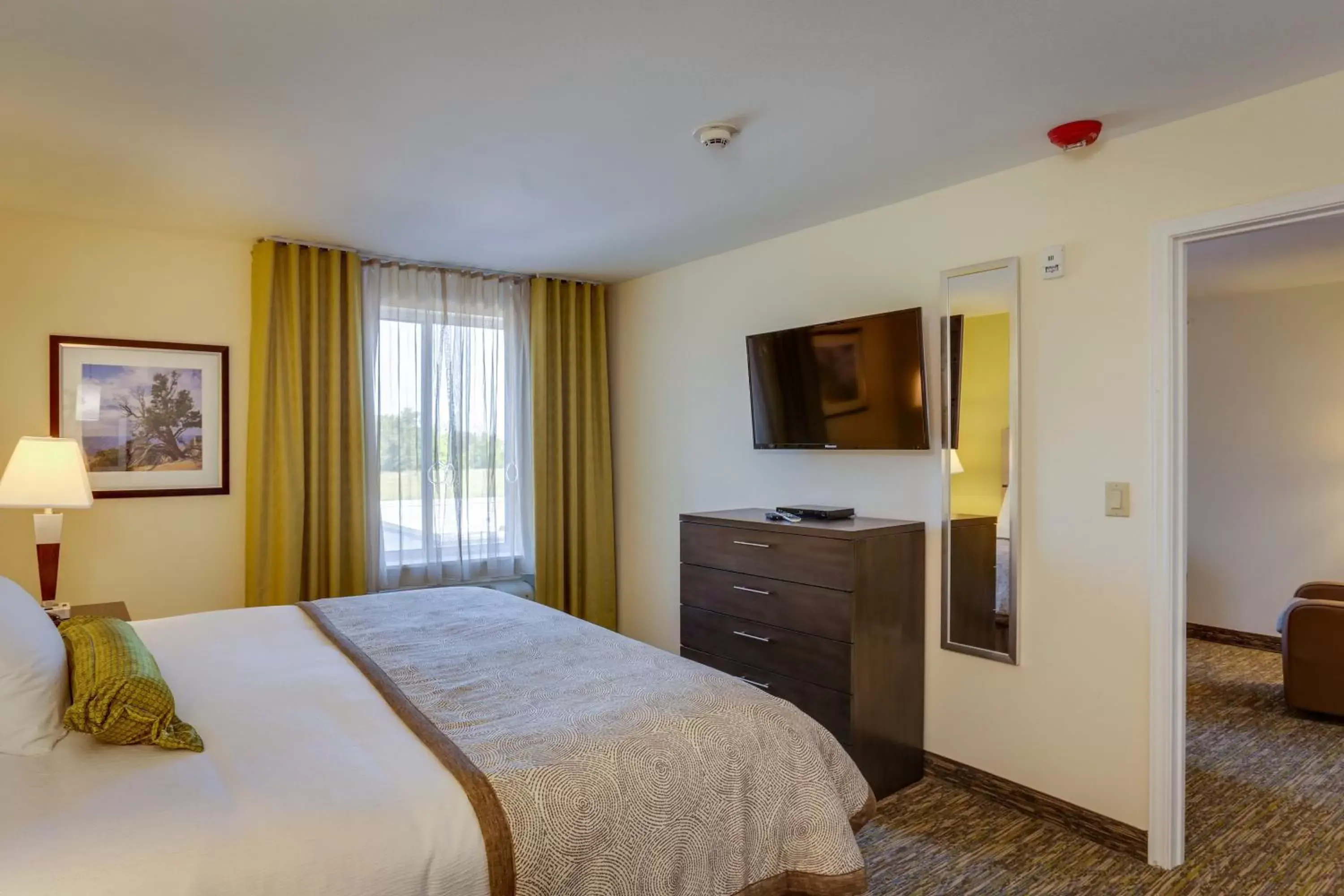 Photo of the whole room, Bed in Candlewood Suites College Station, an IHG Hotel