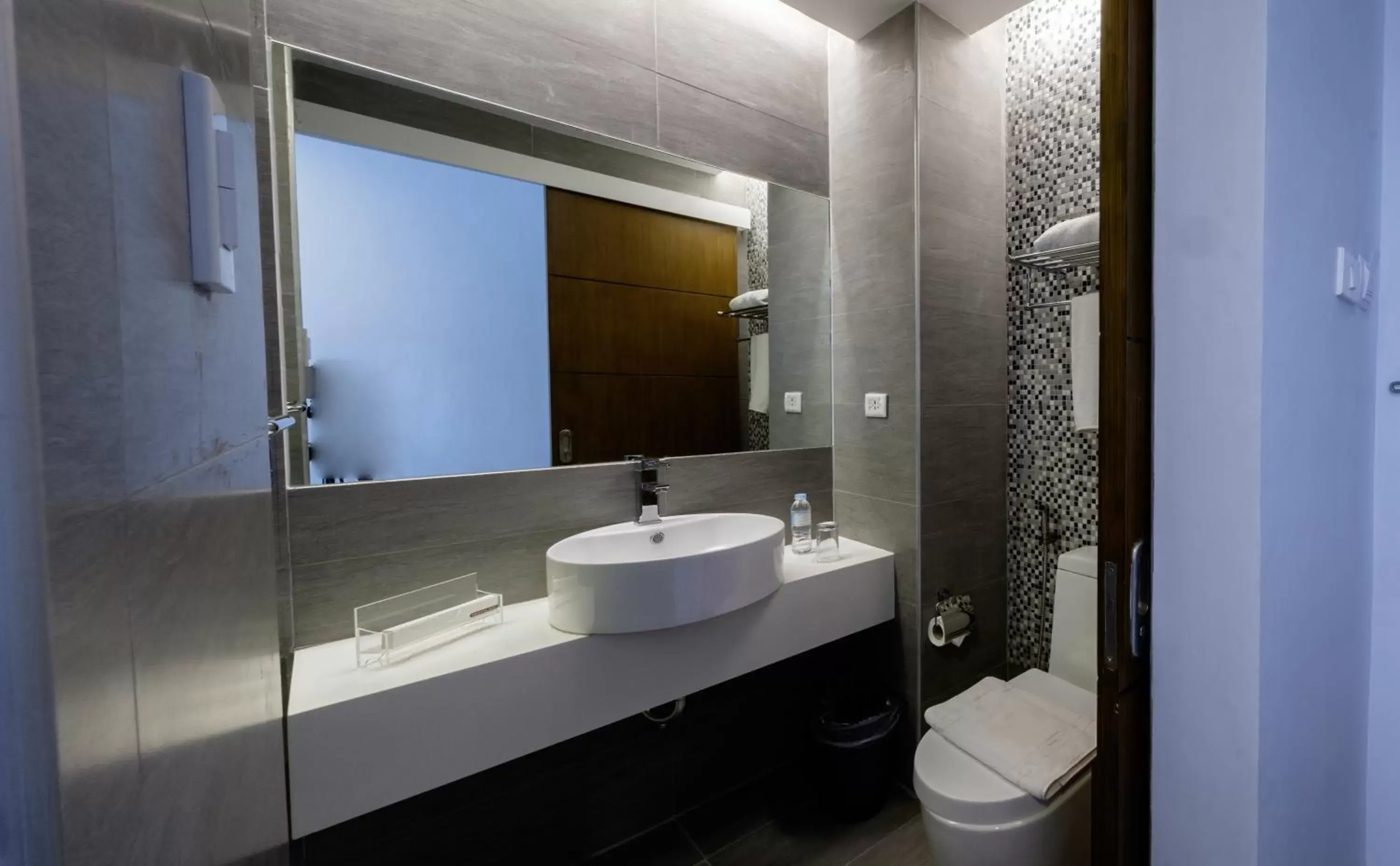 Shower, Bathroom in One Central Hotel & Suites