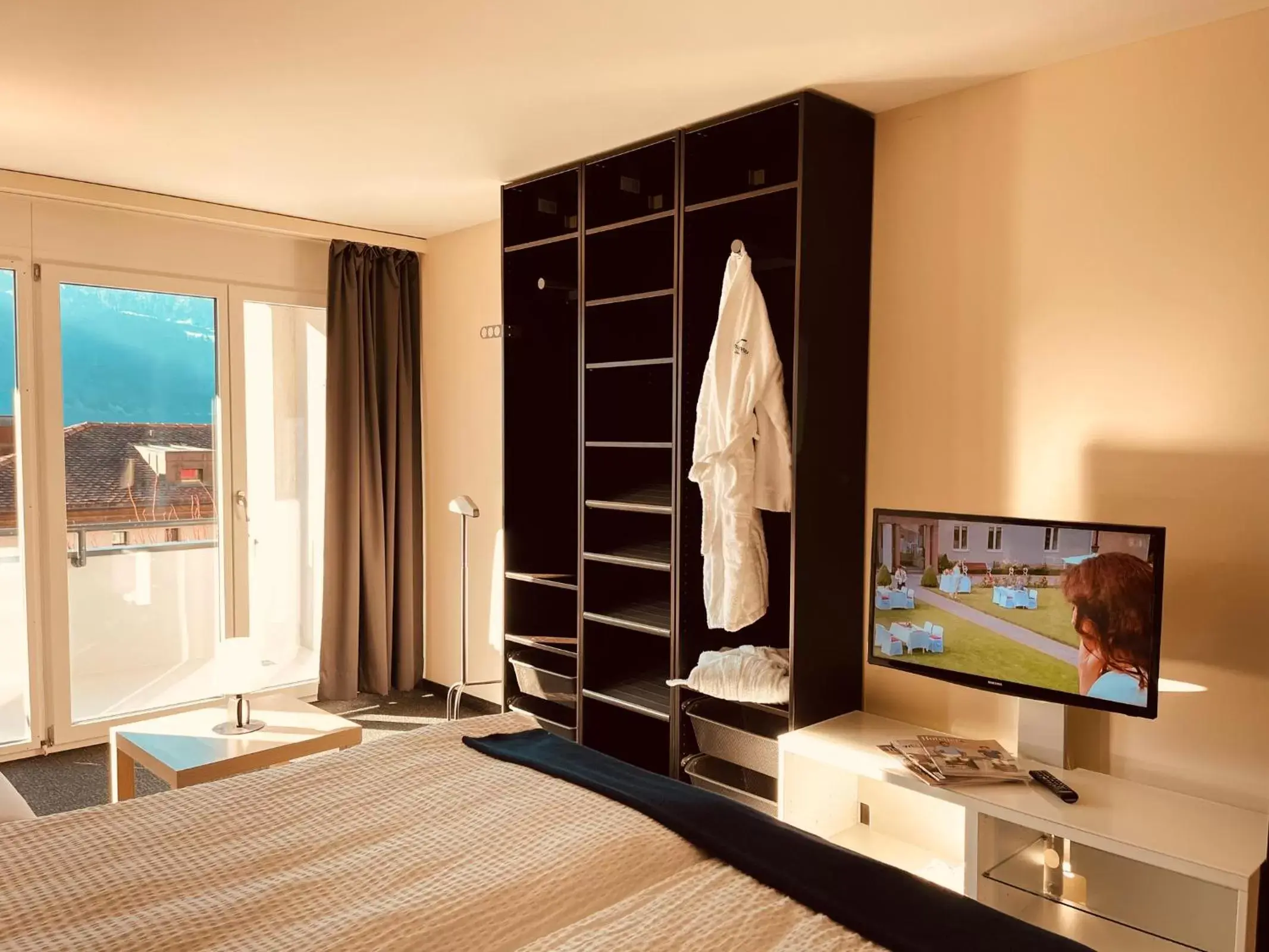 TV and multimedia, TV/Entertainment Center in Seehotel Riviera at Lake Lucerne