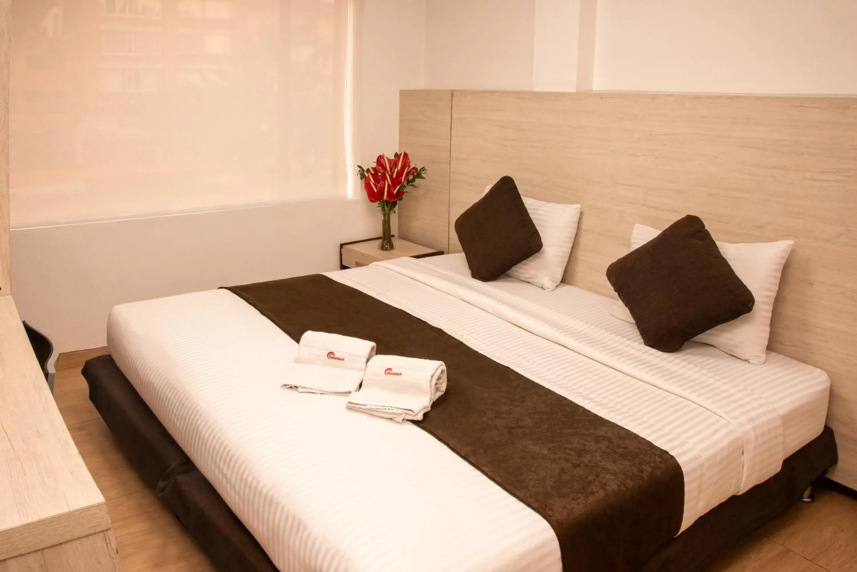 Bed in Hotel Bestmark Platino