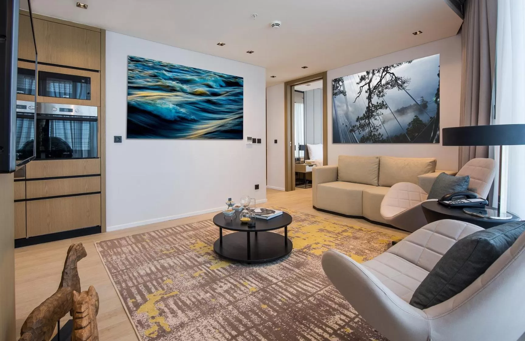 Living room in WestSide Residences by Rotana