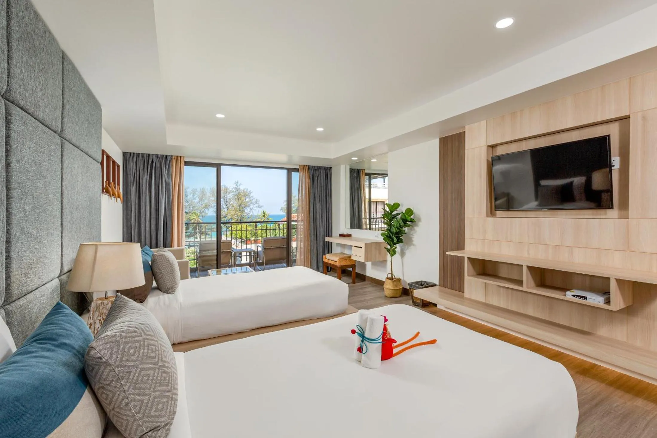 Photo of the whole room, Bed in Baan Laimai Beach Resort & Spa - SHA Extra Plus