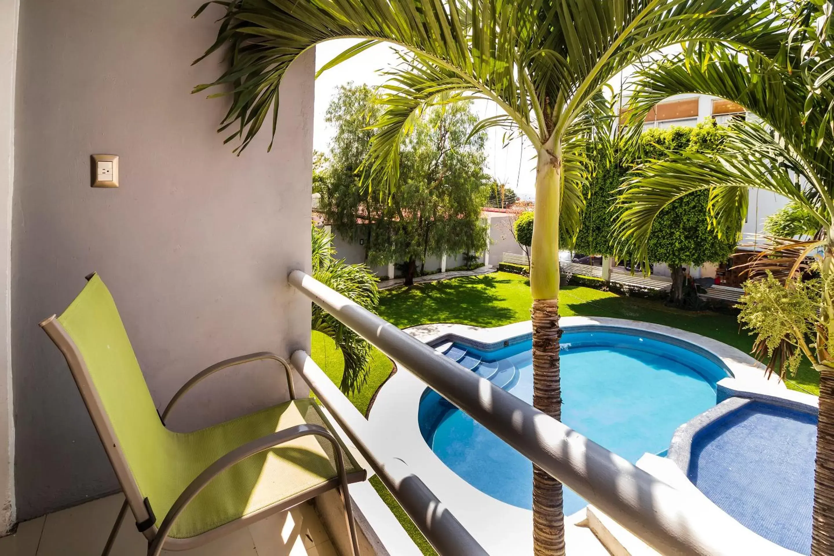 Bedroom, Pool View in Collection O Hotel Mango,Six Flags Hurricane Harbor Oaxtepec