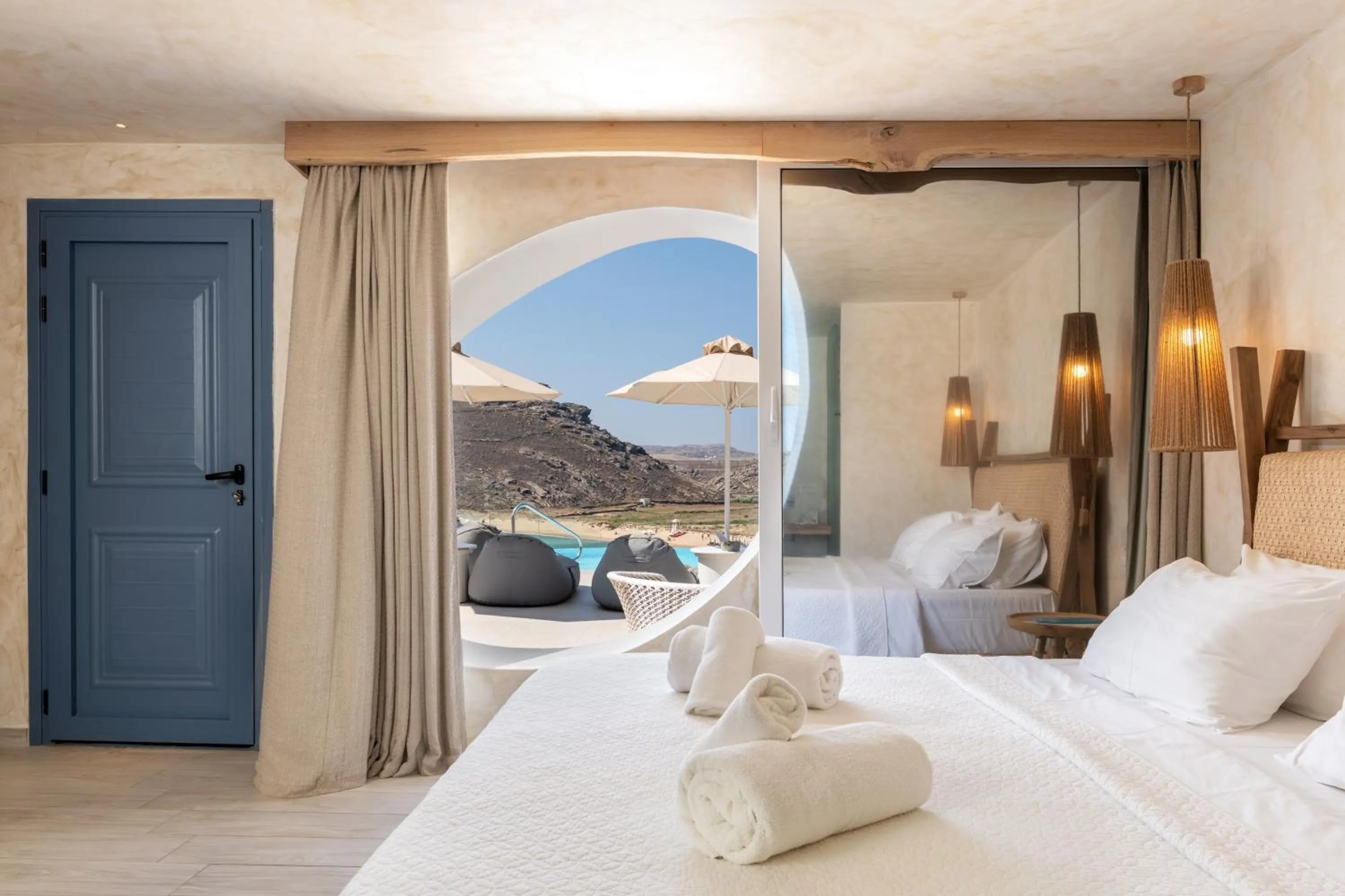 Patio, Bed in Panormos Village Hotel