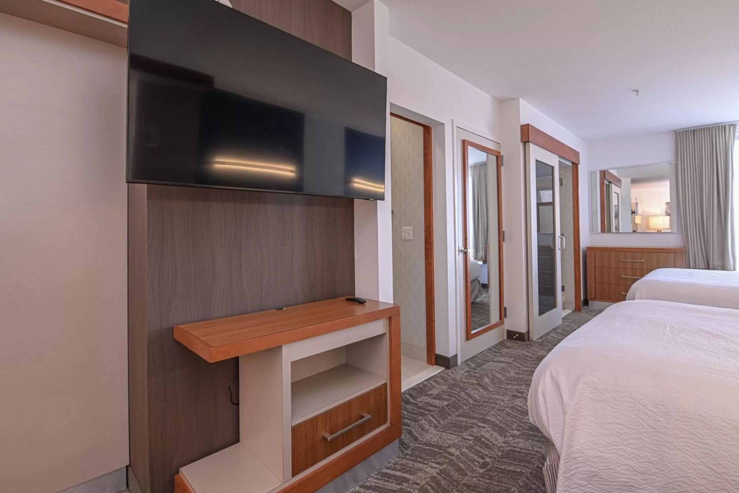 Photo of the whole room, TV/Entertainment Center in SpringHill Suites Grand Forks