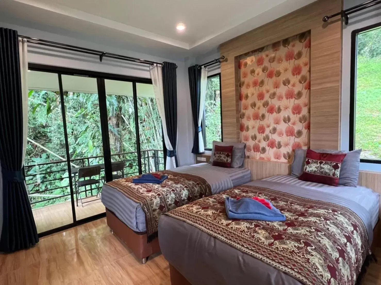 Bed in Khaosok Rainforest Resort